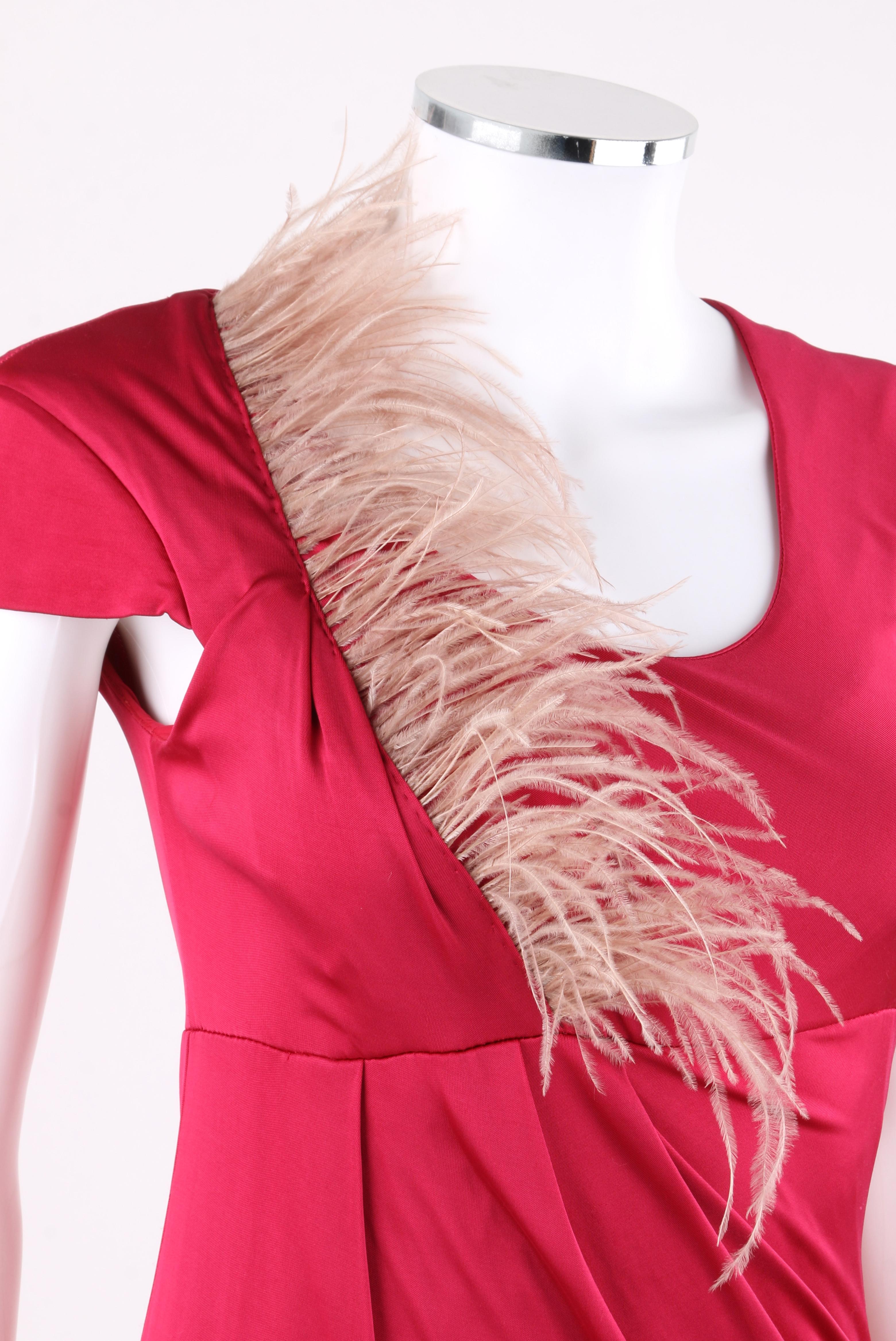 ALEXANDER McQUEEN c.2006 Cerise Silk Jersey Draped Ostrich Feather Top

Brand / Manufacturer: Alexander McQueen
Designer: Alexander McQueen
Style: Jersey Top
Color(s): Shades of Pink
Lined: Yes
Unmarked Fabric Content (feels like): Silk; ostrich