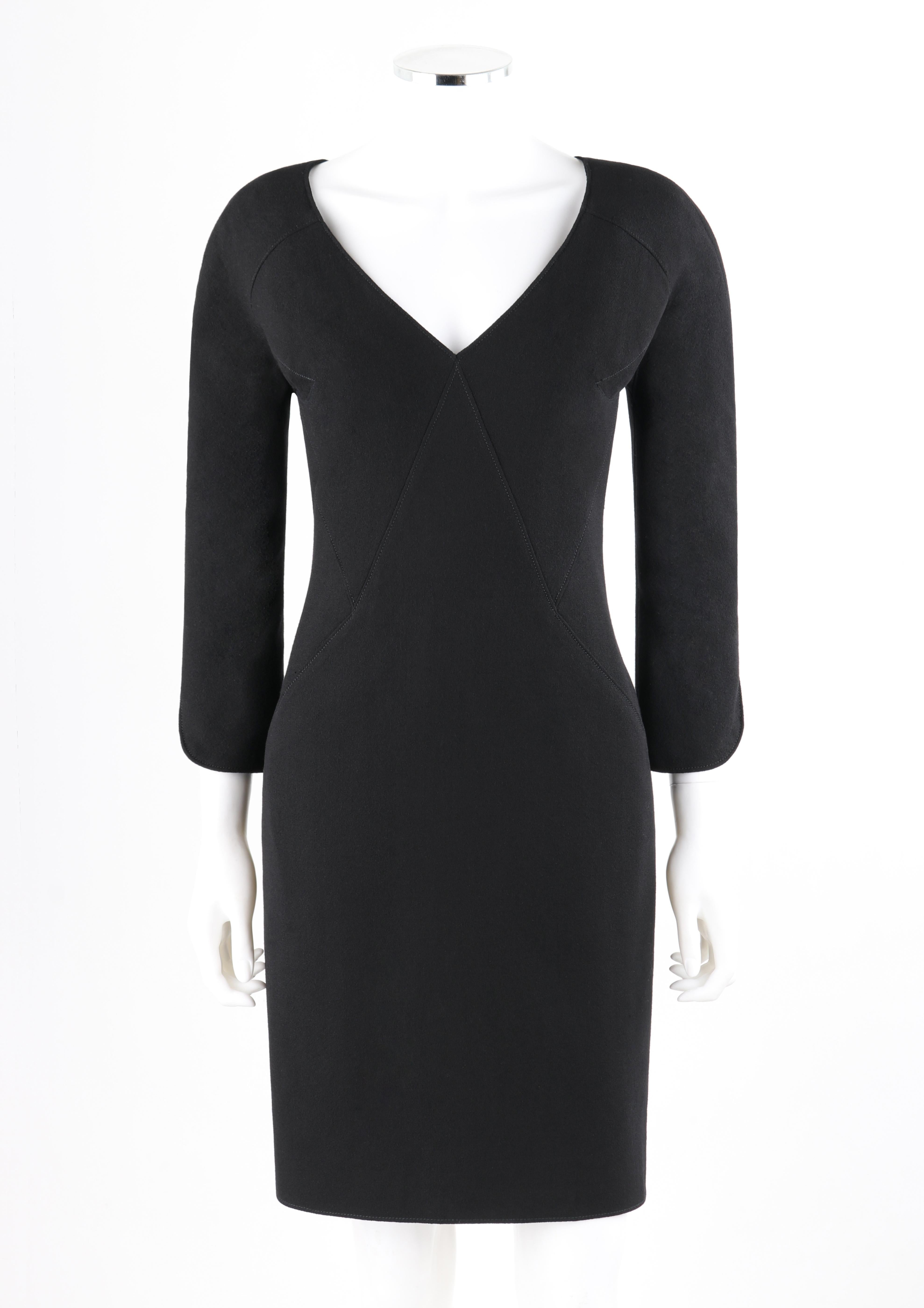 ALEXANDER McQUEEN c.2007 Black Wool Geometric Paneled V-Neck Cocktail Dress

Brand / Manufacturer: Alexander McQueen
Designer: Alexander McQueen
Collection: c.2007
Style: Sheath Dress
Color(s): Black
Lined: Yes
Marked Fabric Content: 100% Wool;