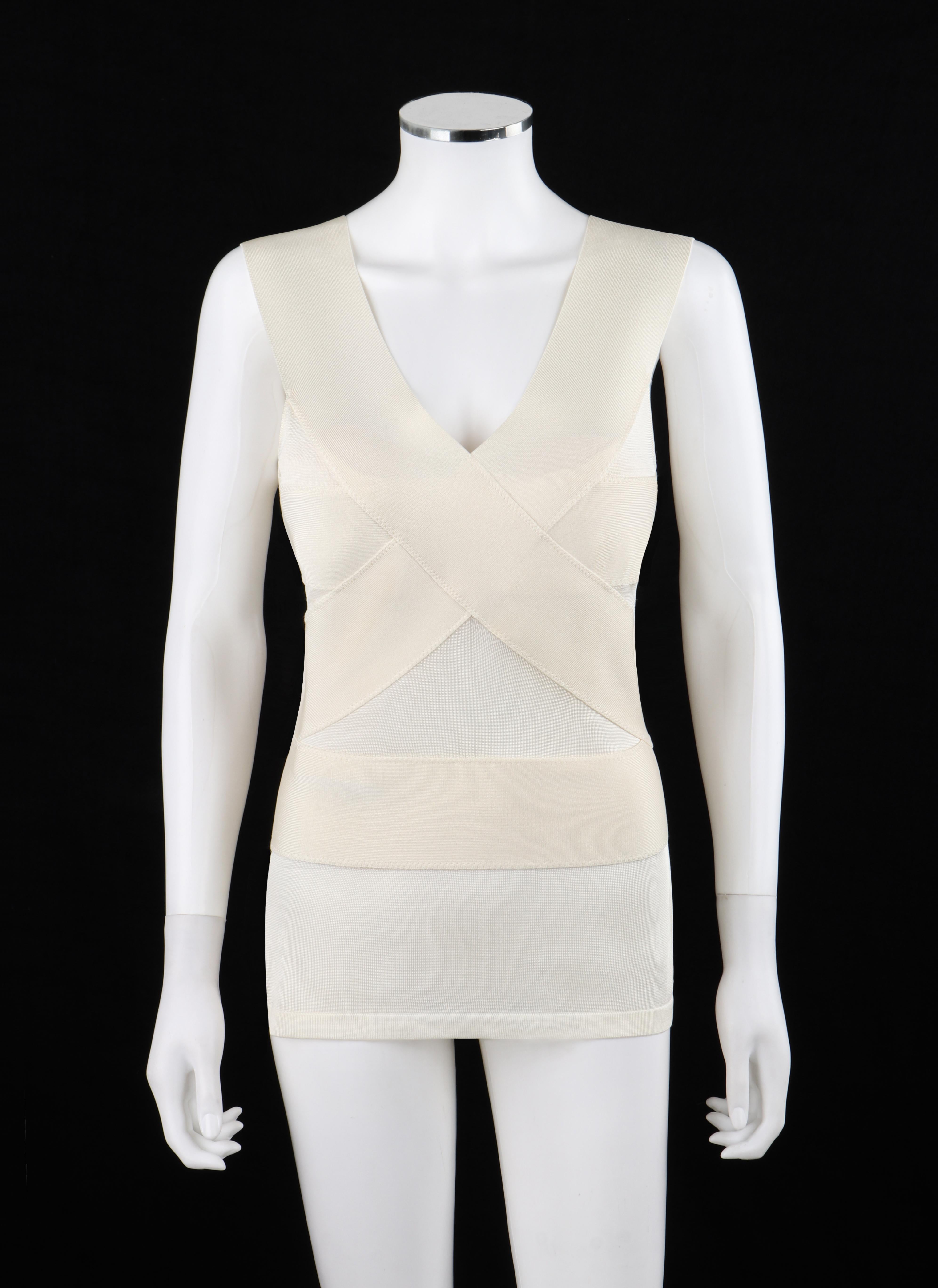 Brand / Manufacturer: Alexander McQueen
Circa: 2007
Designer: Alexander McQueen
Style: Sleeveless Top
Color(s): Shades of ivory,
Lined: No
Marked Fabric Content: 