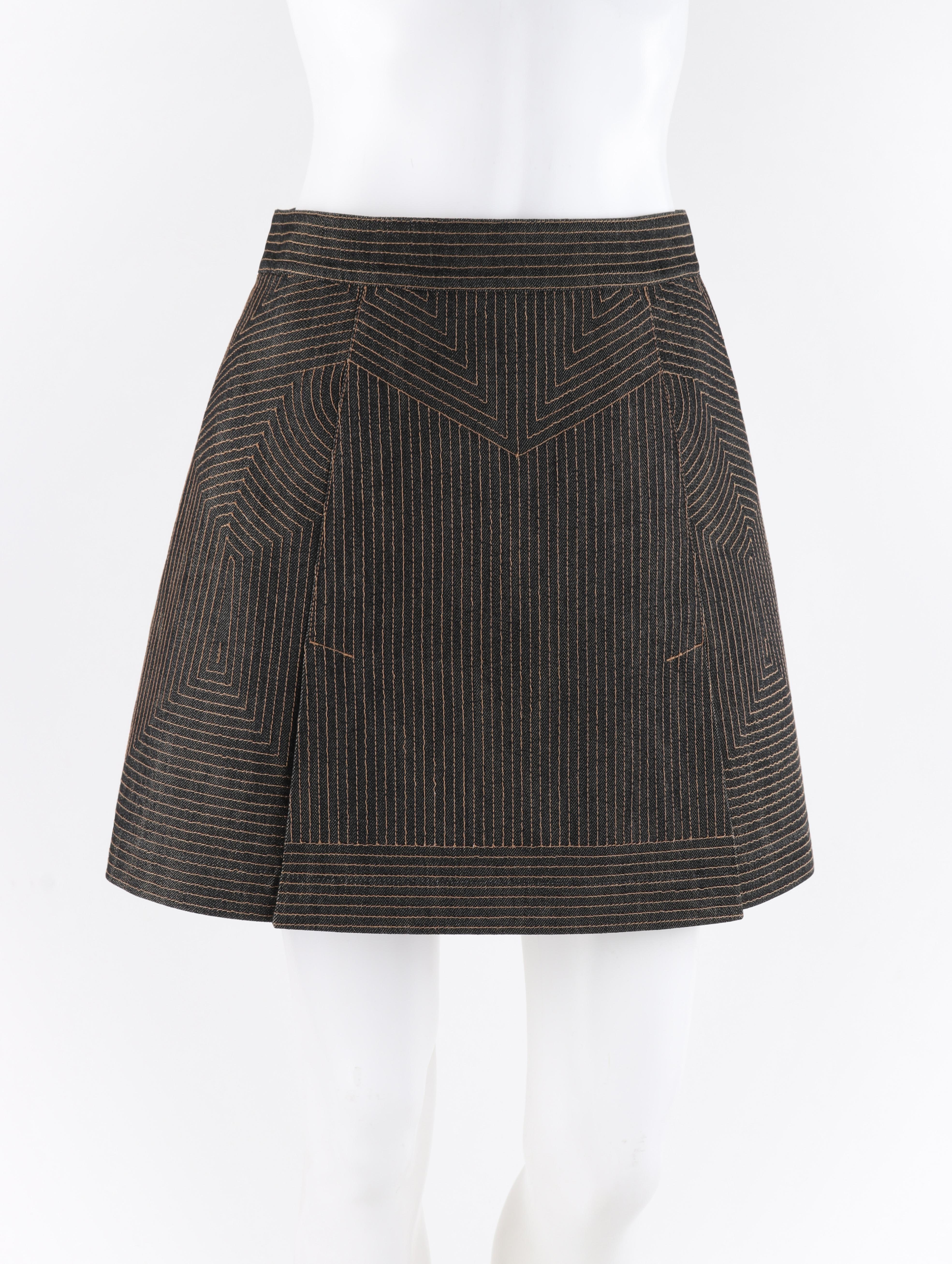 ALEXANDER McQUEEN'S twist on a denim mini skirt with stunning detailed pattern gold top stitching.

ALEXANDER McQUEEN c.2008 Black Denim Patterned Top Stitched Mini Skirt

Brand / Manufacturer: Alexander McQueen
Designer: Alexander