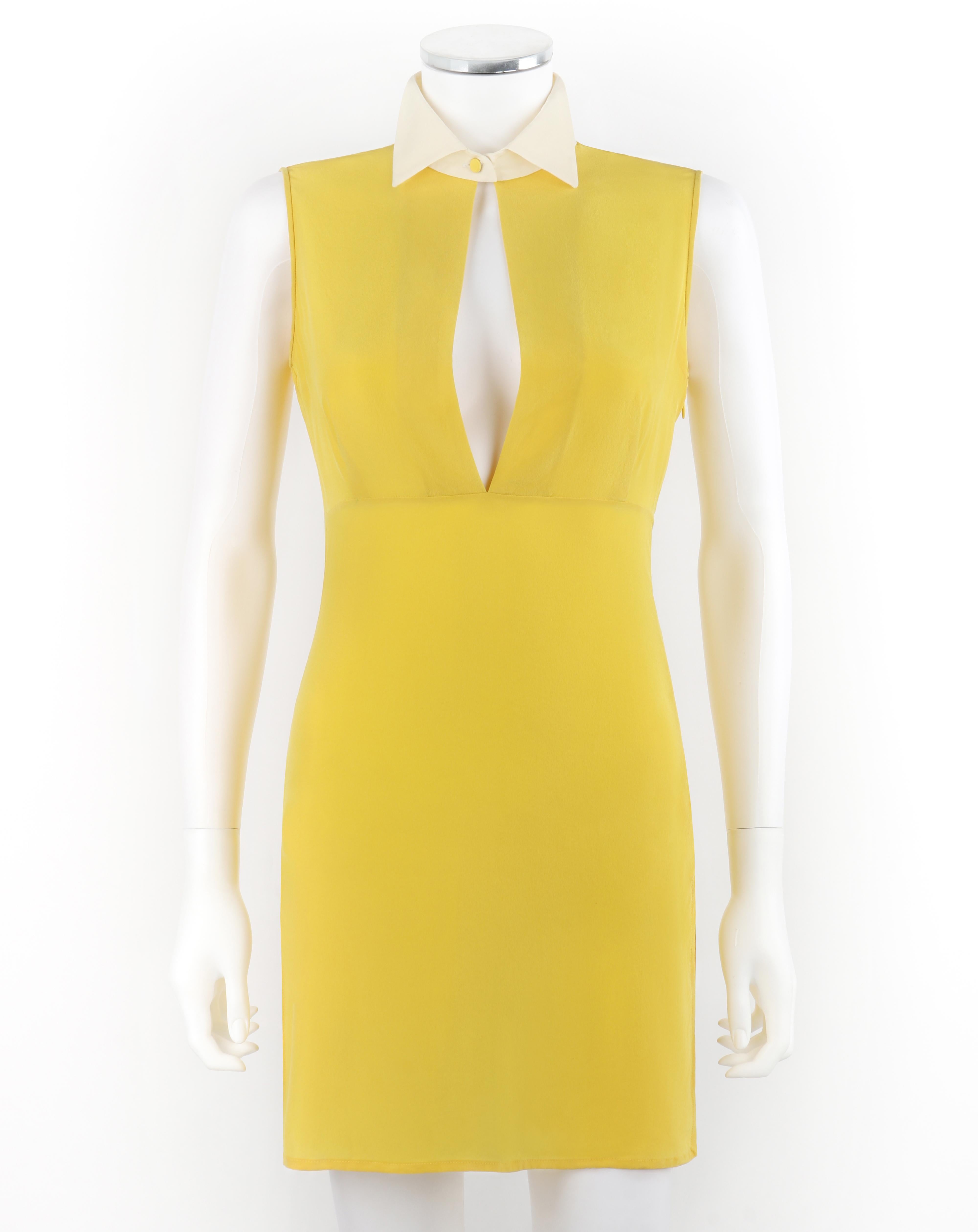 ALEXANDER McQUEEN c.2010 Yellow White Chiffon Keyhole Double Slit Mini Dress

Brand / Manufacturer: Alexander McQueen 
Circa: 2010
Designer: Alexander McQueen
Style: Mini Dress
Color(s): Shades of yellow, white
Lined: No
Unmarked Fabric Content