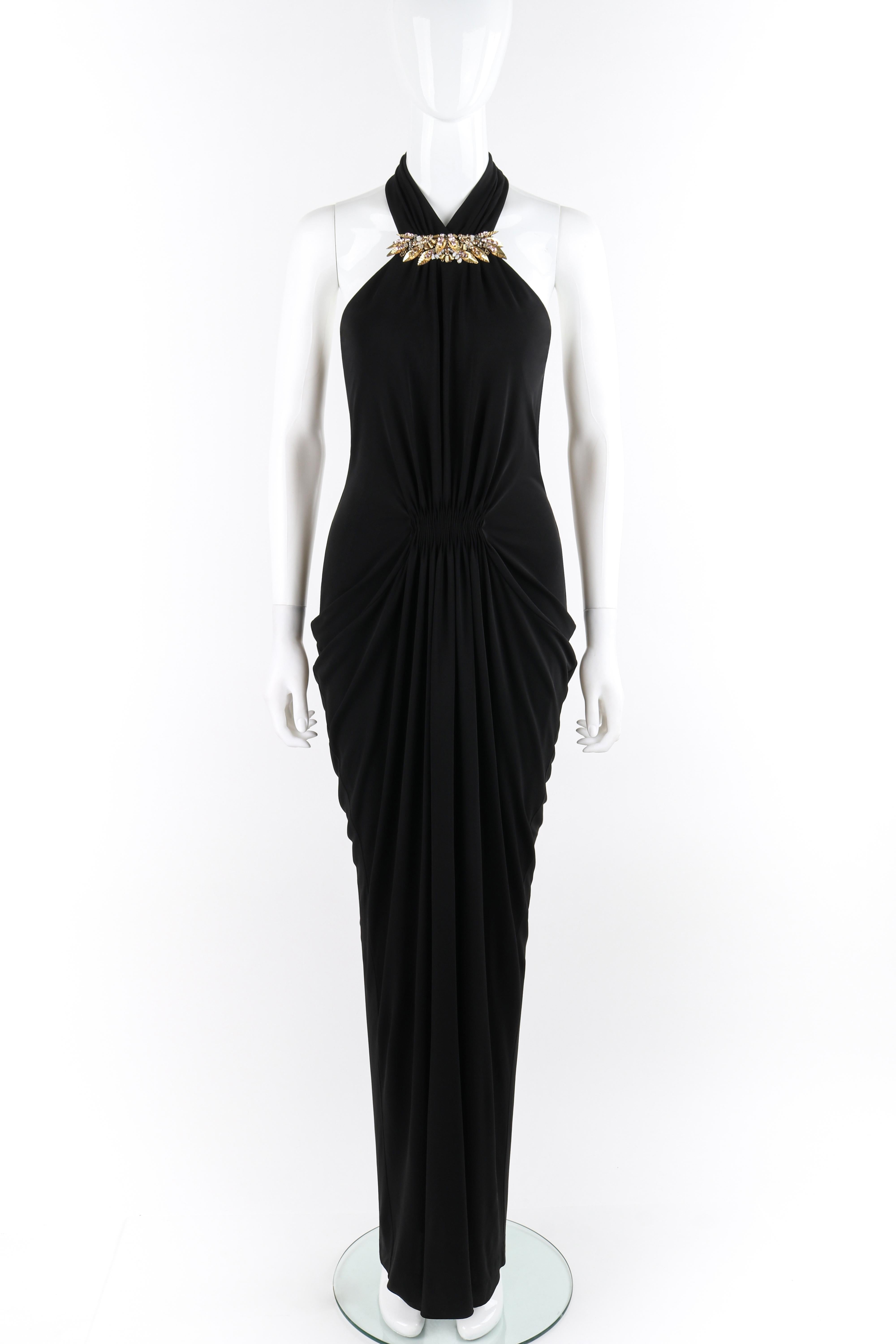 Brand / Manufacturer: Alexander McQueen
Circa: 2013
Designer: Sarah Burton  
Style: Halter Maxi Dress
Color(s): Shades of black, gold, pink, white
Lined: Yes
Marked Fabric Content: 