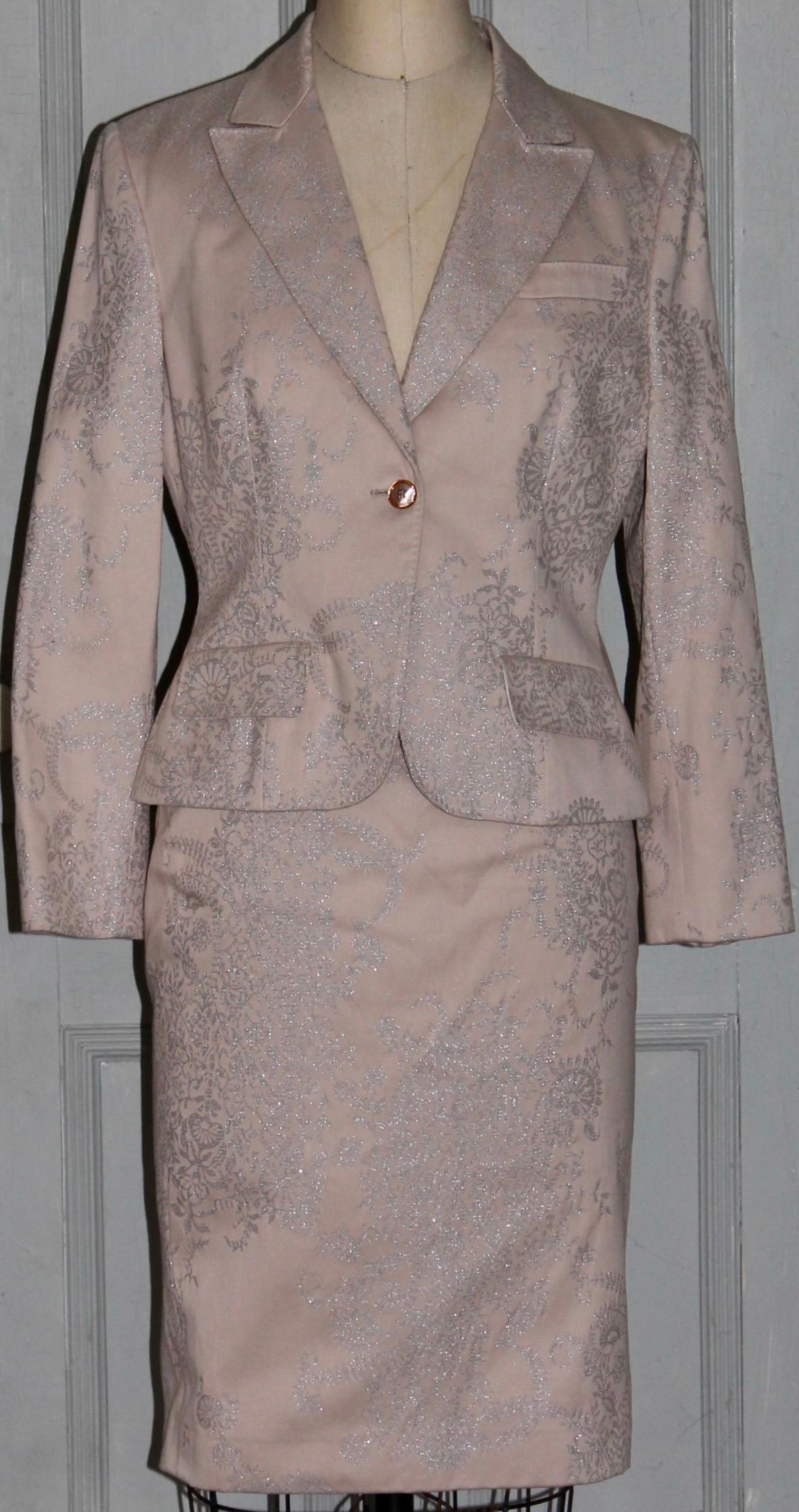 Offering an Alexander McQueen Pale Rose Skirt Suit, with impressed silver metallic floral design. Made in Italy.  Chain Label (needs reattaching). Length of jacket 23
