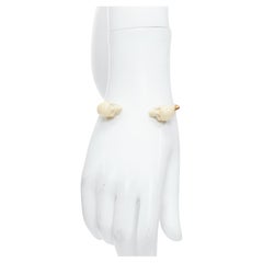 ALEXANDER MCQUEEN brazalete puño doble calavera esmalte crema tono oro