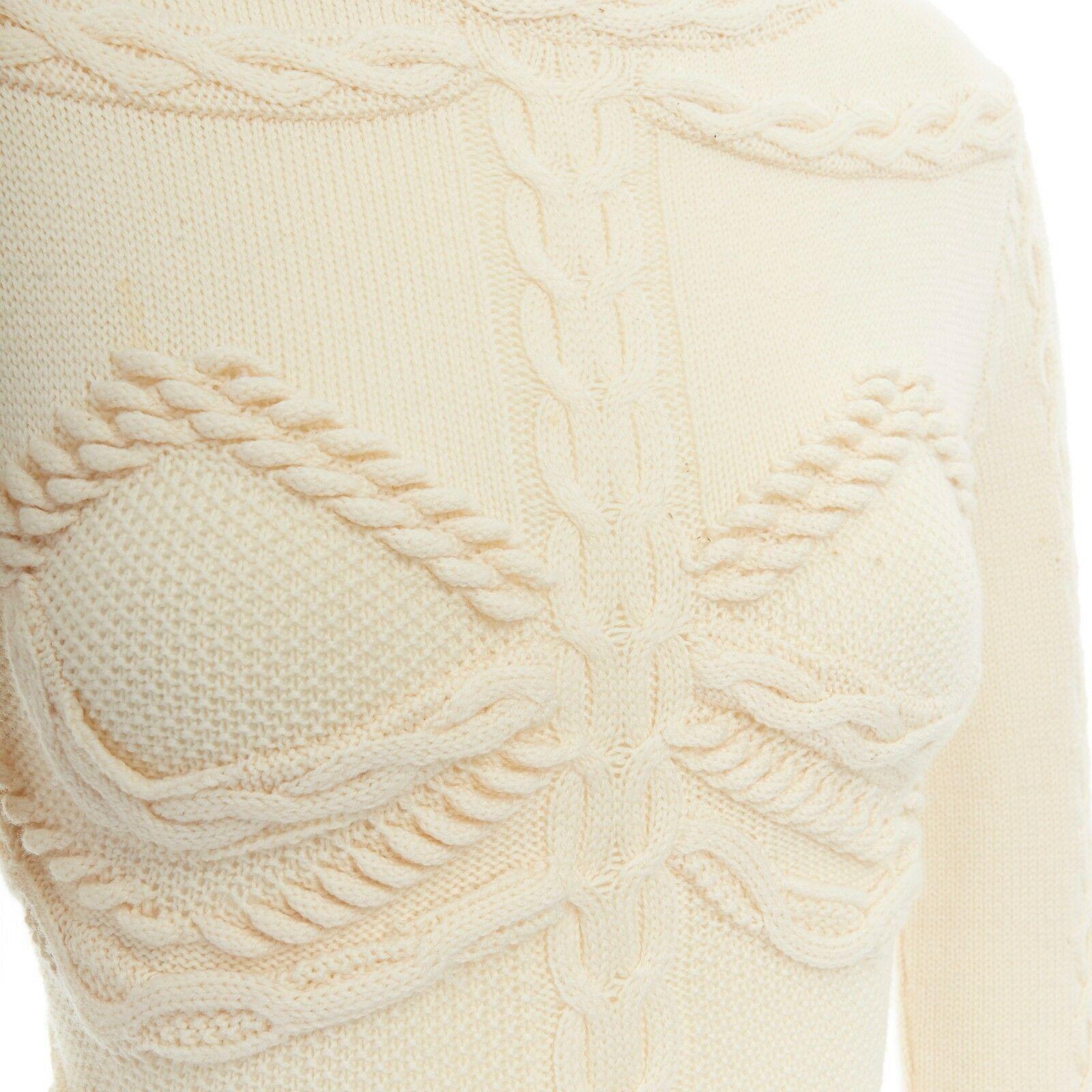 ALEXANDER MCQUEEN cream skeleton bustier cable knit dress US0 UK6 IT38 FR34 XS

ALEXANDER MCQUEENCream wool. Textured. Skeletal spine and bustier textured cable knit. Fit flare dress. Cocktail dress. Made in Italy.

SIZING
Size reference: XS / US0 /