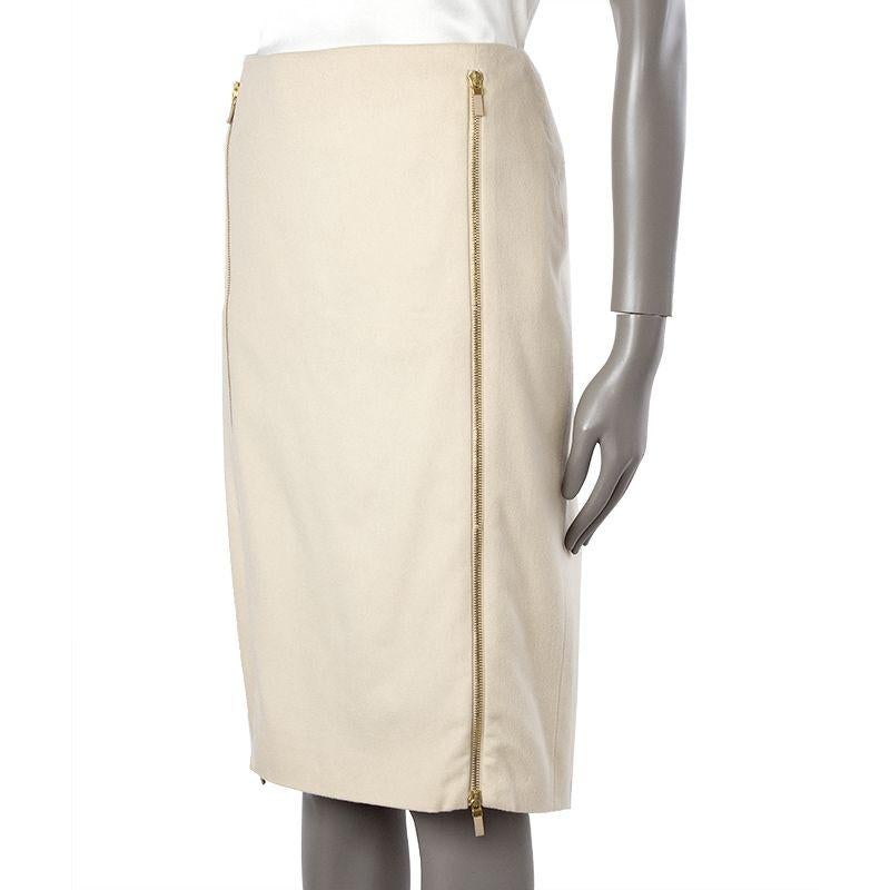 Alexander McQueen trumpet skirt in black wool (89%), nylon (9%), and spandex (2%). Closes with one hook and invisible zipper. Lined in black sateen fabric. Has been worn and is in excellent condition. 

Tag Size 44
Size L
Waist 82cm (32in)
Hips 94cm