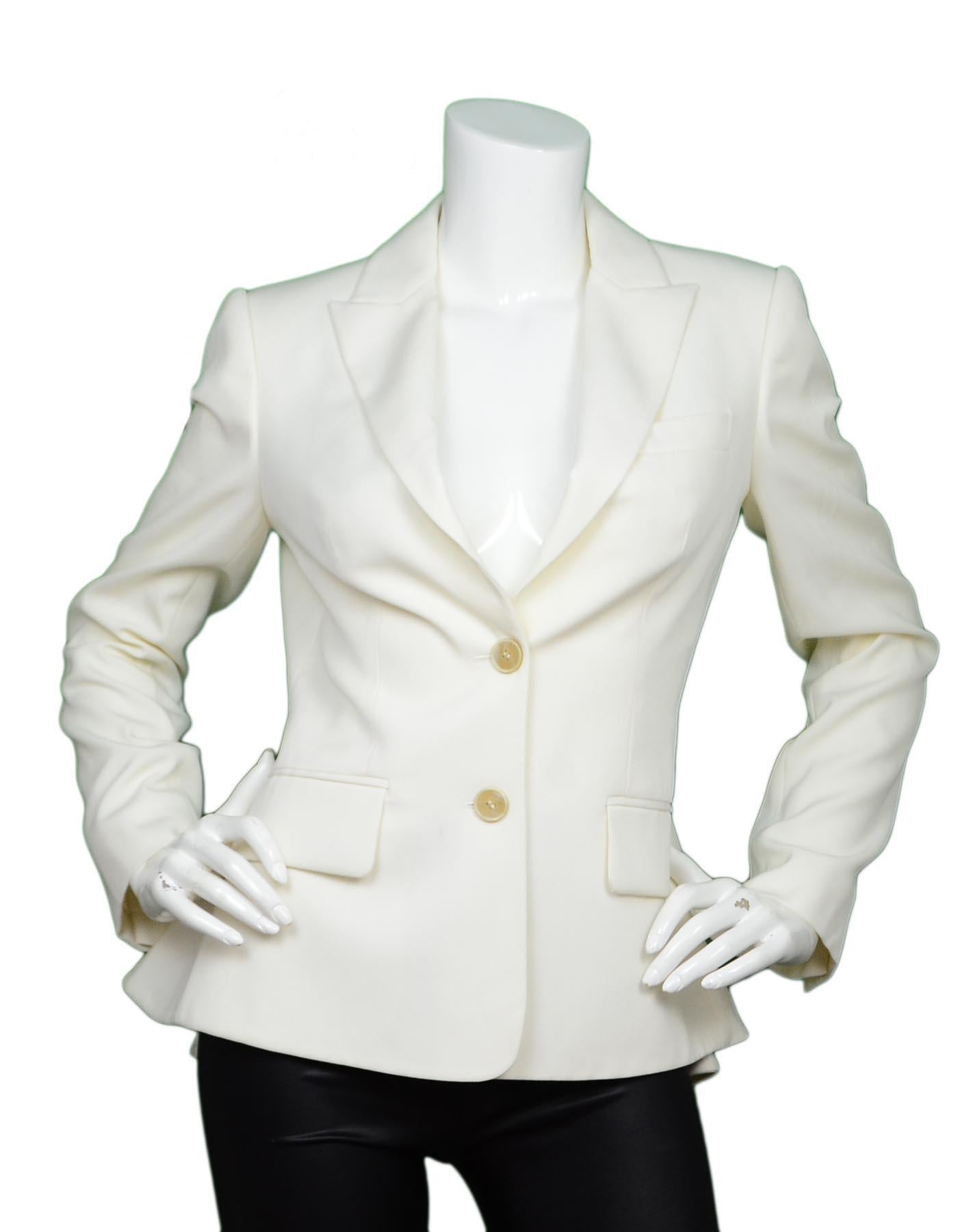Alexander McQueen Cream Wool Jacket W/ Peplum Back Sz 40

Made In: Italy
Color: Cream
Materials: 100% wool
Lining: 100% cupro
Opening/Closure: Button front
Overall Condition: Very good pre-owned condition with exception of some