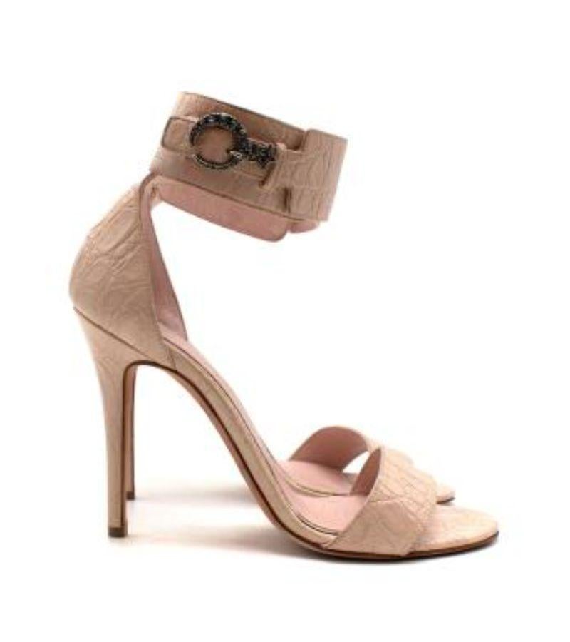 Alexander McQueen Crocodile-effect Blush Pink Heels

- Ankle fastening with crystal embellishment
- Open toe
- Closed heel
- Branded insole
- Crocodile effect throughout

Material
Leather

Made in Italy

9.5/10 Excellent Condition. Minor signs of