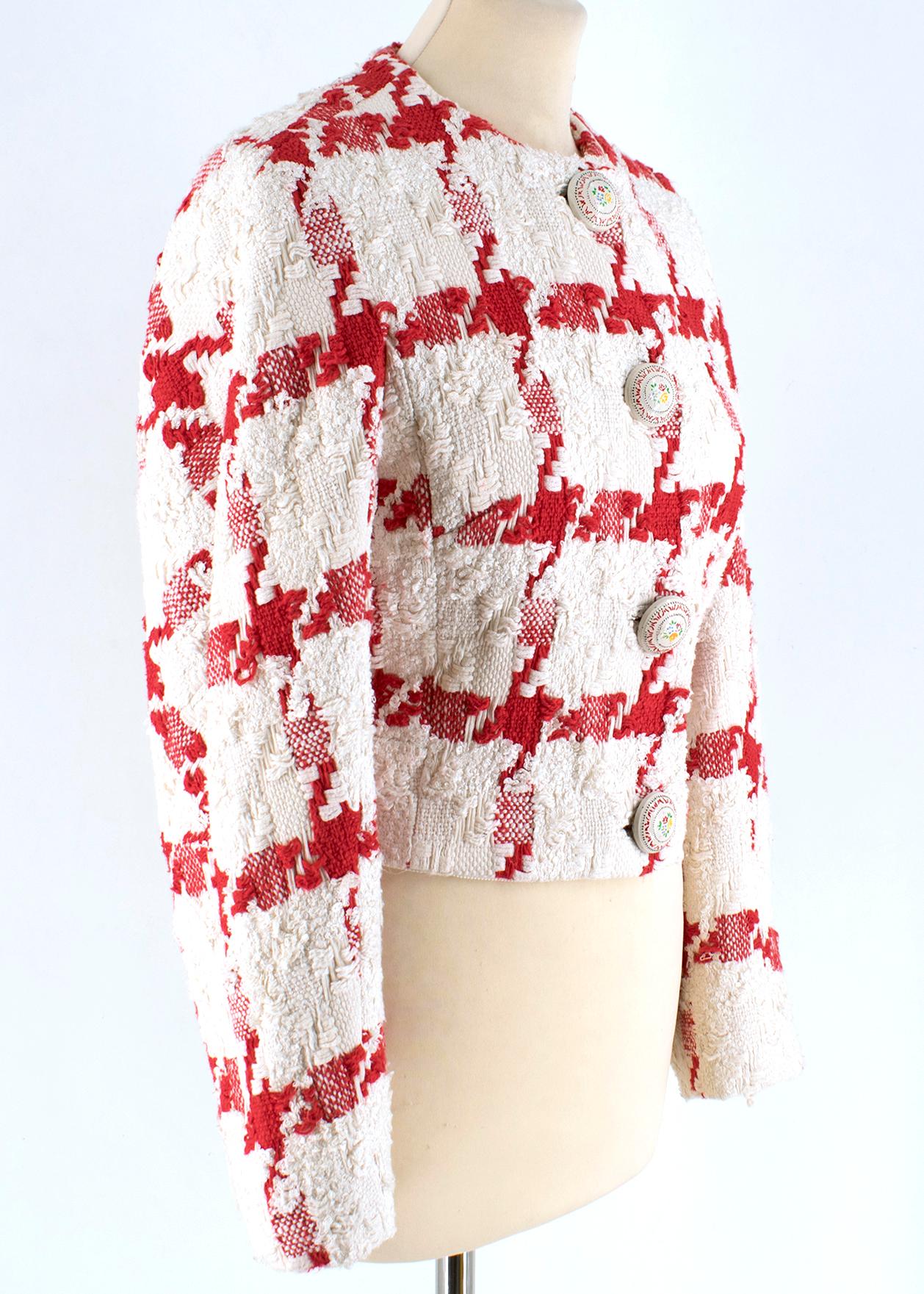 Alexander McQueen Crop Check Tweed Jacket 

Large red stitch pattern design 
Cropped tailored jacket 
Metal floral design button fastenings 
Long sleeve with crew neckline 
Soft cream interior fabric 


Please note, these items are pre-owned and may