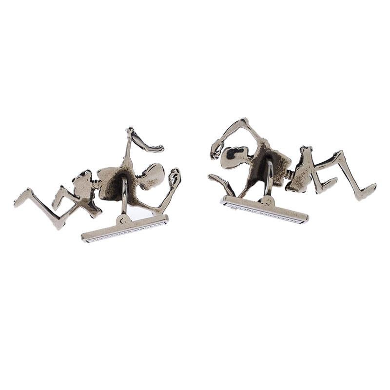 Women's Alexander McQueen Dancing Skeleton Silver Tone Cufflinks