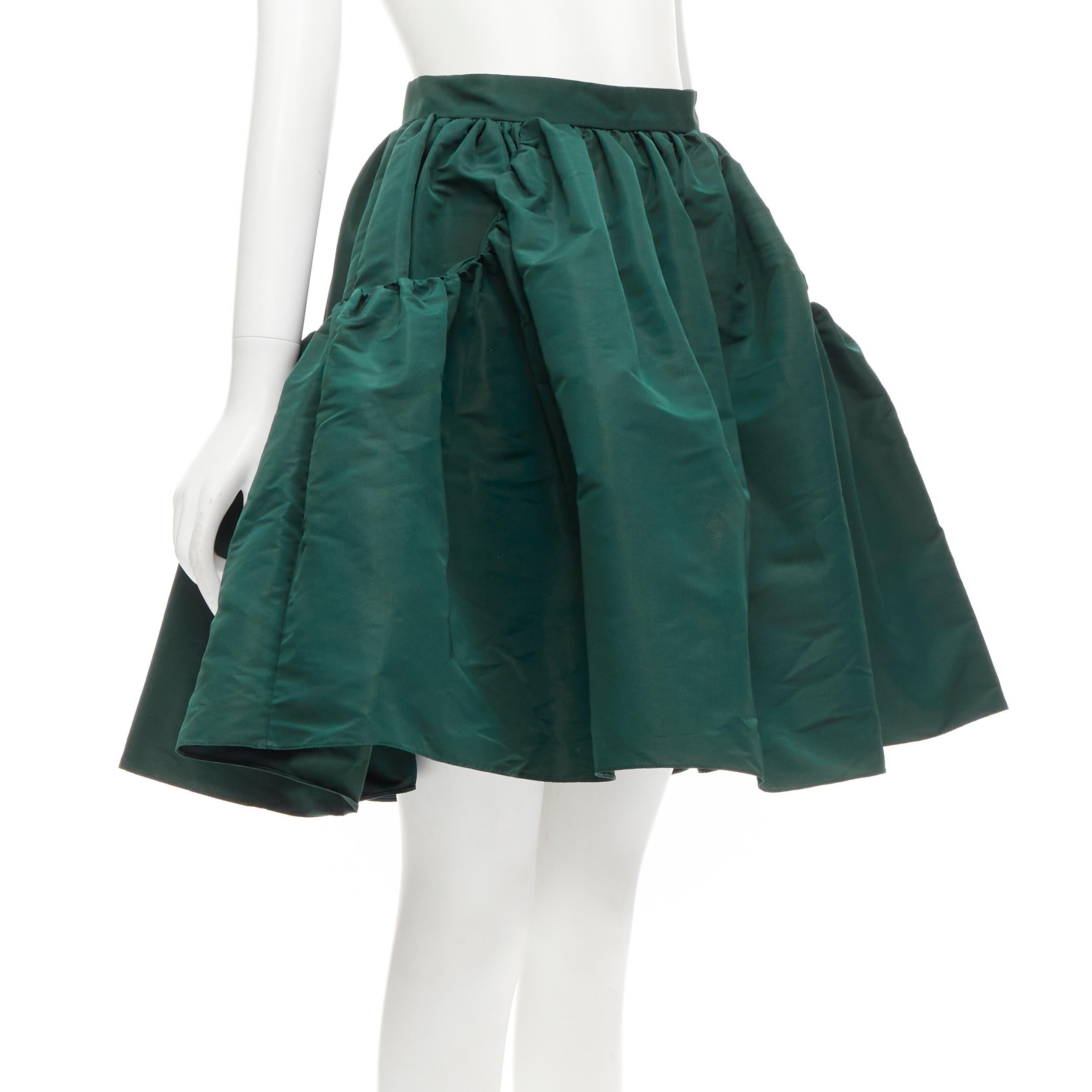 ALEXANDER MCQUEEN dark green taffeta gathered A-line puff skirt IT38 XS
Reference: AAWC/A00356
Brand: Alexander McQueen
Designer: Sarah Burton
Material: Polyester
Color: Green
Pattern: Solid
Closure: Zip
Extra Details: Double pocket details.
Made