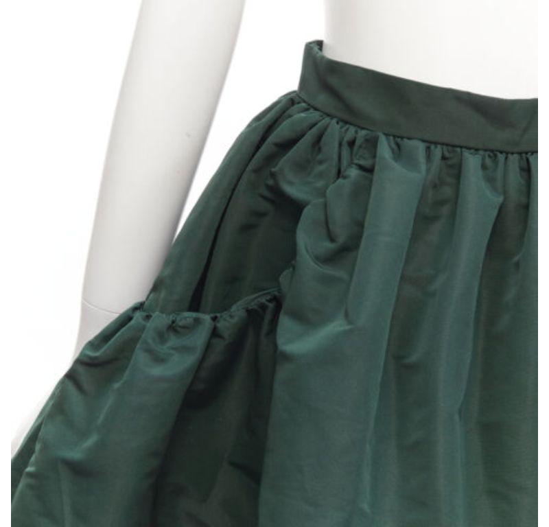 ALEXANDER MCQUEEN dark green taffeta gathered A-line puff skirt IT38 XS
Reference: AAWC/A00356
Brand: Alexander McQueen
Designer: Sarah Burton
Material: Polyester
Color: Green
Pattern: Solid
Closure: Zip
Extra Details: Double pocket details.
Made