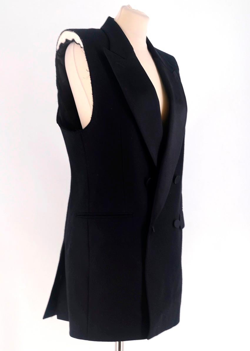 Alexander McQueen Deconstructed Sleeveless Blazer

- Black, mid-weight, deconstructed sleeveless blazer
- Peak lapels
- Double-breasted, button fastening
- Decorative chest welt pocket
- Front flap and jet pockets

Please note, these items are