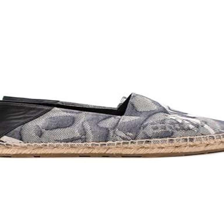 Alexander McQueen Denim & Black Leather Espadrilles 

- Patterened lightweight denim in various tones of blue, with contrasting blanket stitch and raffia midsole, and black leather heel 
- Leather lining and a rubber role 

Materials 
100% Leather
