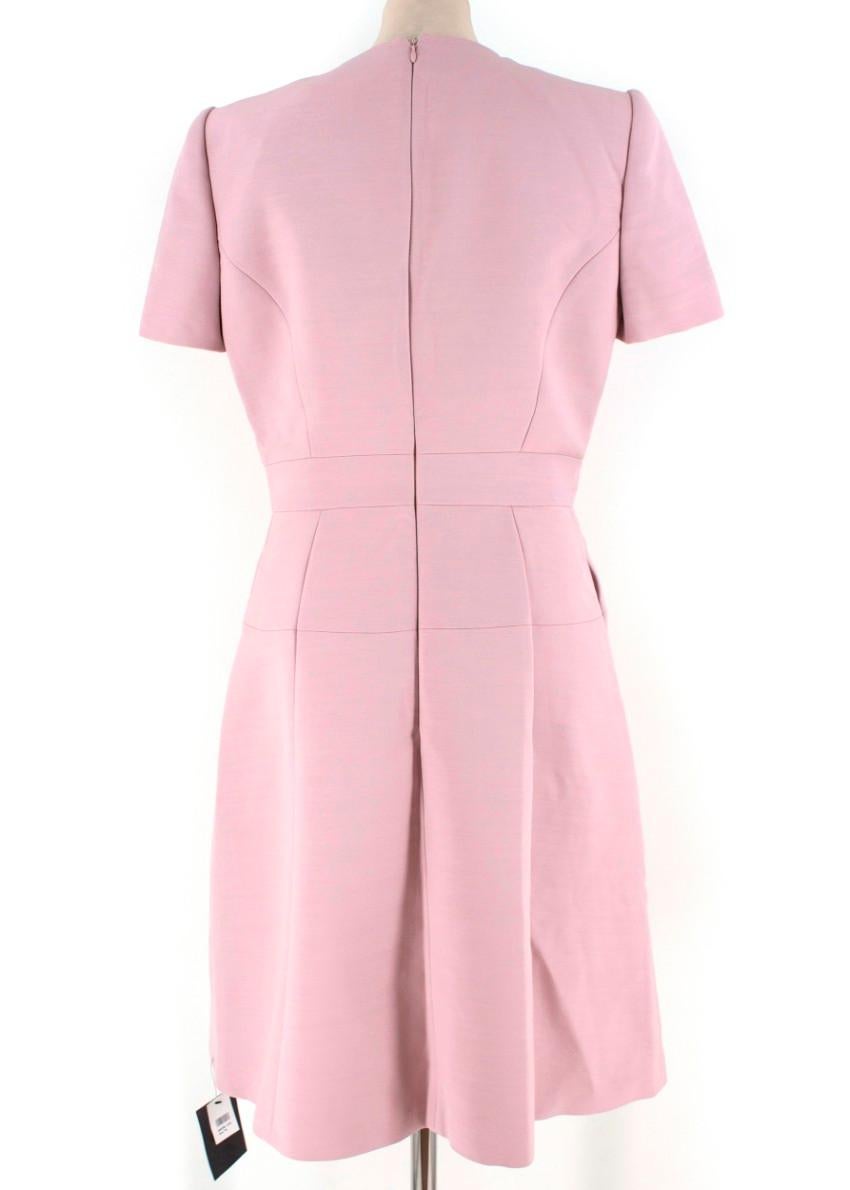 Alexander McQueen Dusty Pink Dress

-Pink V neck dress
-Shoulder pads
-Tailored around the bust and waist
-Pleated skirt
-Back zip closure

Italian 44
Approx:
Length - 106cm
Shoulder width - 40cm
Sleeve length - 17cm