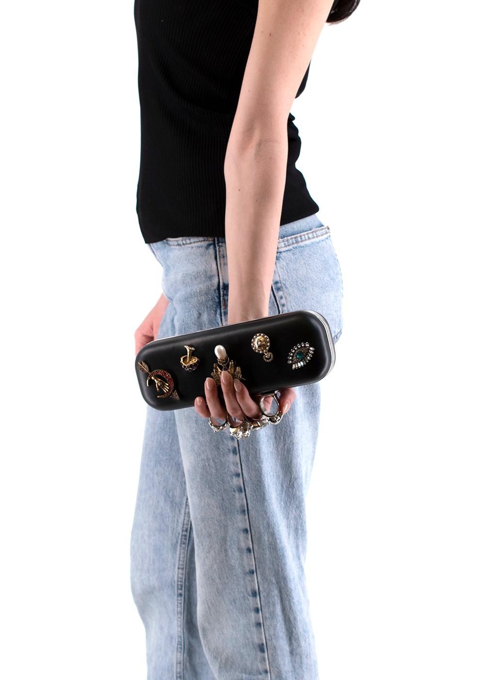 alexander mcqueen skull four-ring clutch bag
