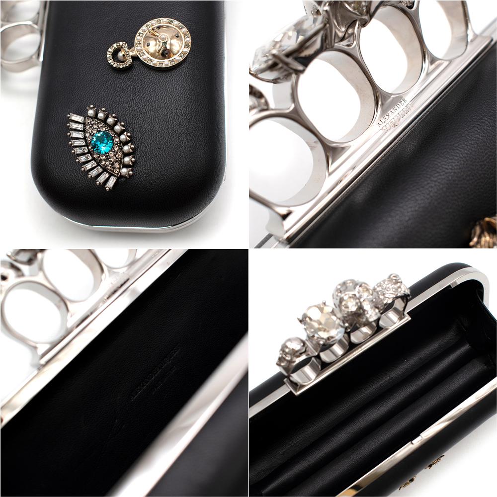 Alexander McQueen embellished black leather four-ring clutch bag 1