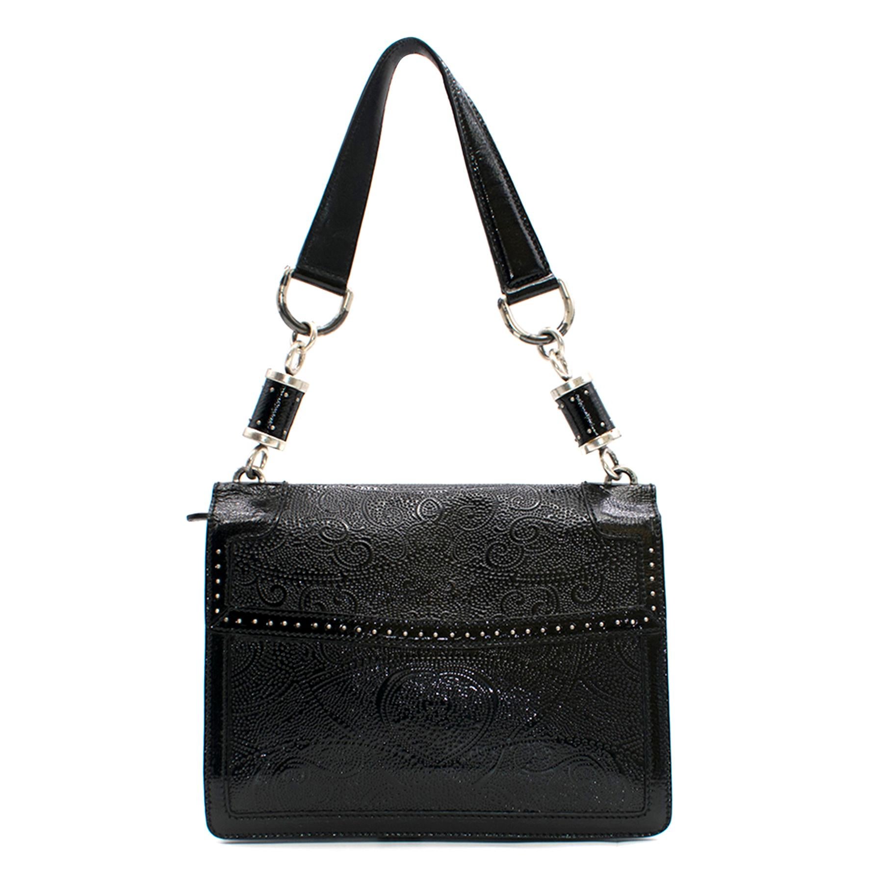 Alexander McQueen Black Embossed-Leather Shoulder Bag

- An original Alexander McQueen item 
- Silver toned hardware 
- Top leather handle 
- Embossed covered leather
- Front flap, chain & pin-clasp closure 
- Stud-trimmed edges
- Large interior zip