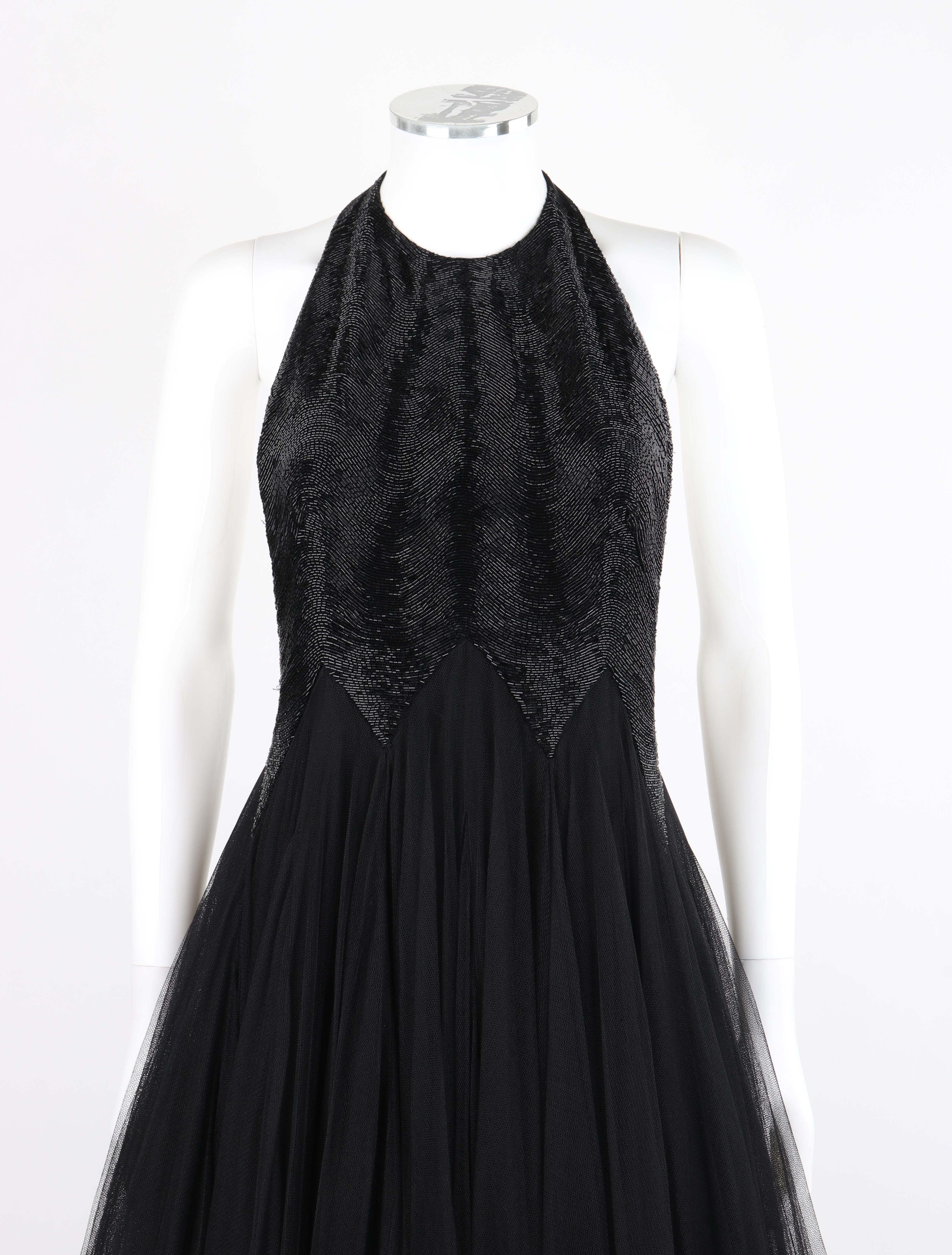 Noir ALEXANDER McQUEEN F/H 2007 - Robe dos nu perlé en tulle superposé noir en vente
