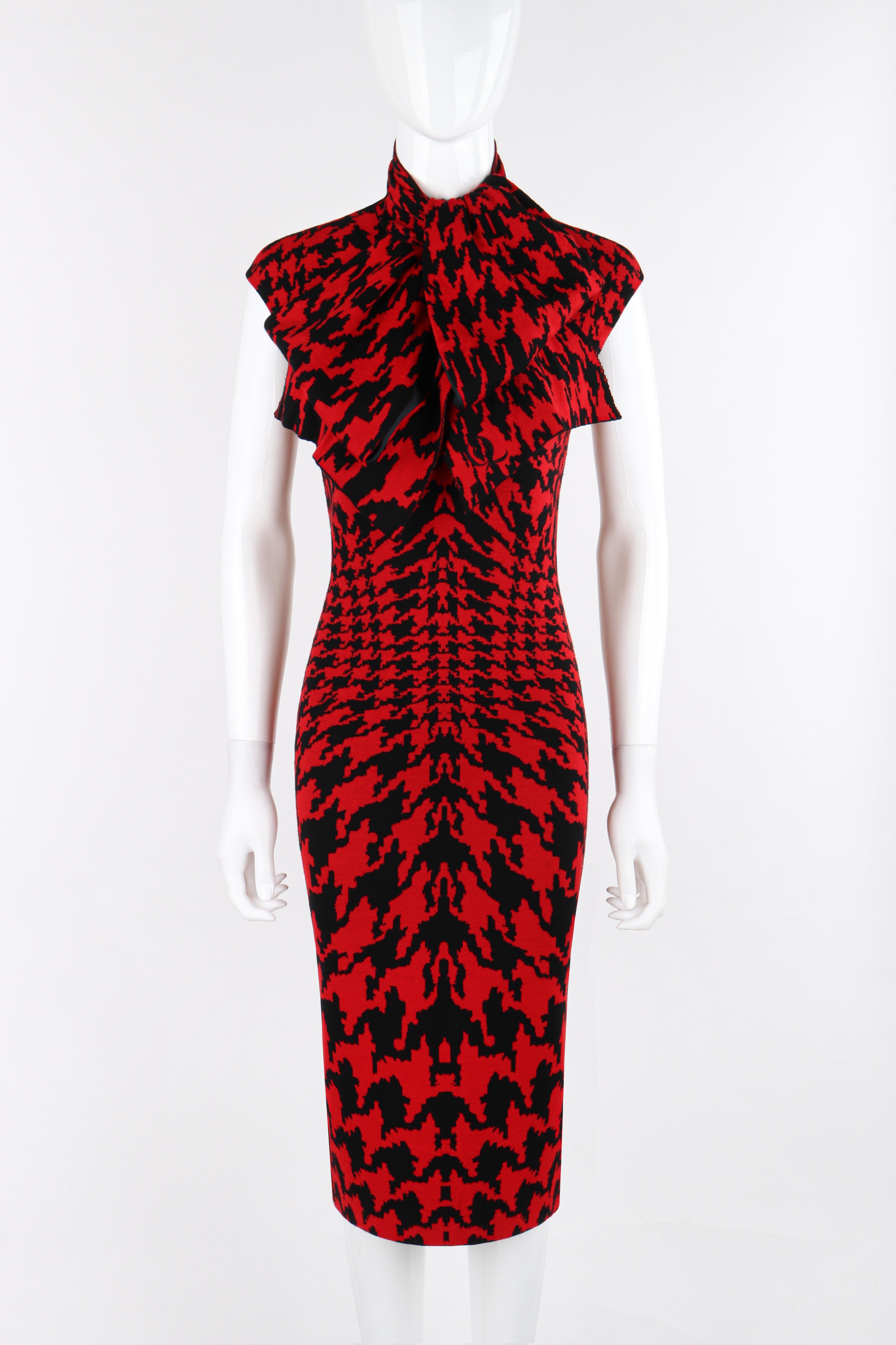 Designed by Alexander McQueen for the fall/winter 2009 collection. Red and black knit houndstooth pattern, in various sizes to accentuate the figure with a slight optical illusion effect. Sleeveless, form-fitting. Material has some stretch to it.
