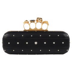 ALEXANDER McQUEEN H/W 2013 Duster-Clutch aus schwarzem und goldenem Leder mit Nieten