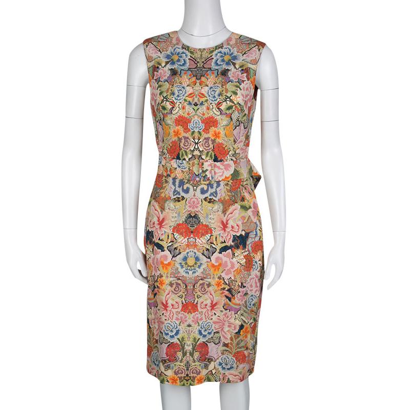 If you are in search of a lovely cocktail dress, look no further! This Alexander McQueen dress has everything that is sure to make a statement. A perfect balance of comfort and style, this dress features kaleidoscope floral print and comes with a