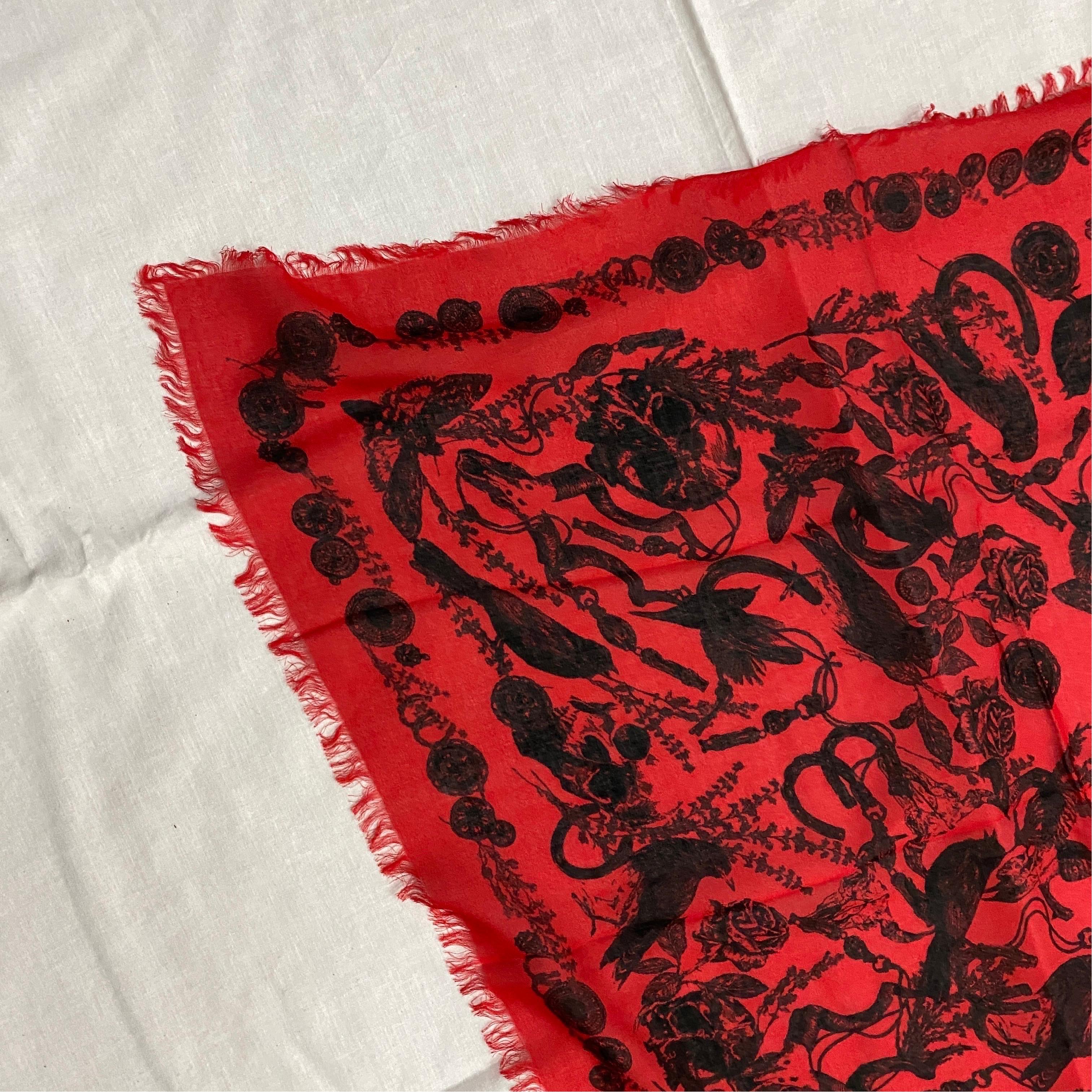 The Alexander McQueen Silk Italian Scarf is a beautiful and luxurious piece of fashion that reflects the innovative and creative style of the late designer Alexander McQueen. McQueen was known for his bold and provocative designs that pushed the