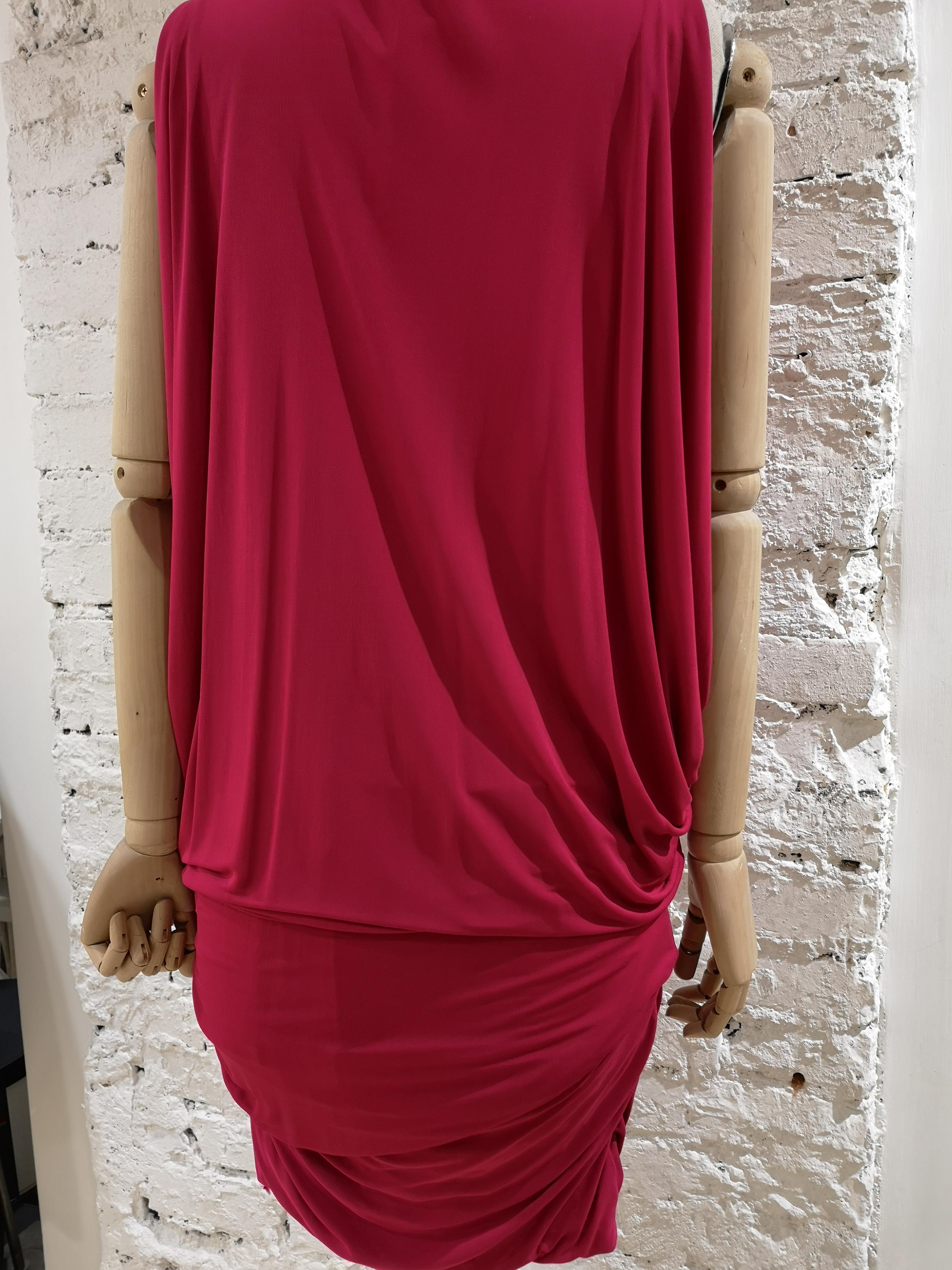 Alexander McQueen Vestido de viscosa fucsia 
Vestido acampanado ajustable McQueen
totalmente made in italy
talla 40
composición: viscosa