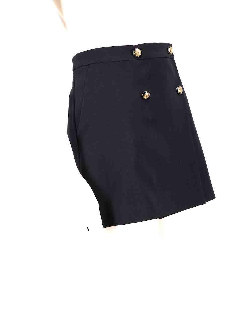 CONDITION is New with tags on this brand new Alexander McQueendesigner item. This item comes with original packaging.
 
 
 
 Details
 
 
 Model: 752499QJACF 4100
 
 Season: FW23
 
 Navy
 
 Wool
 
 Wrap skirt
 
 Mini
 
 Seal buttons
 
 Button up