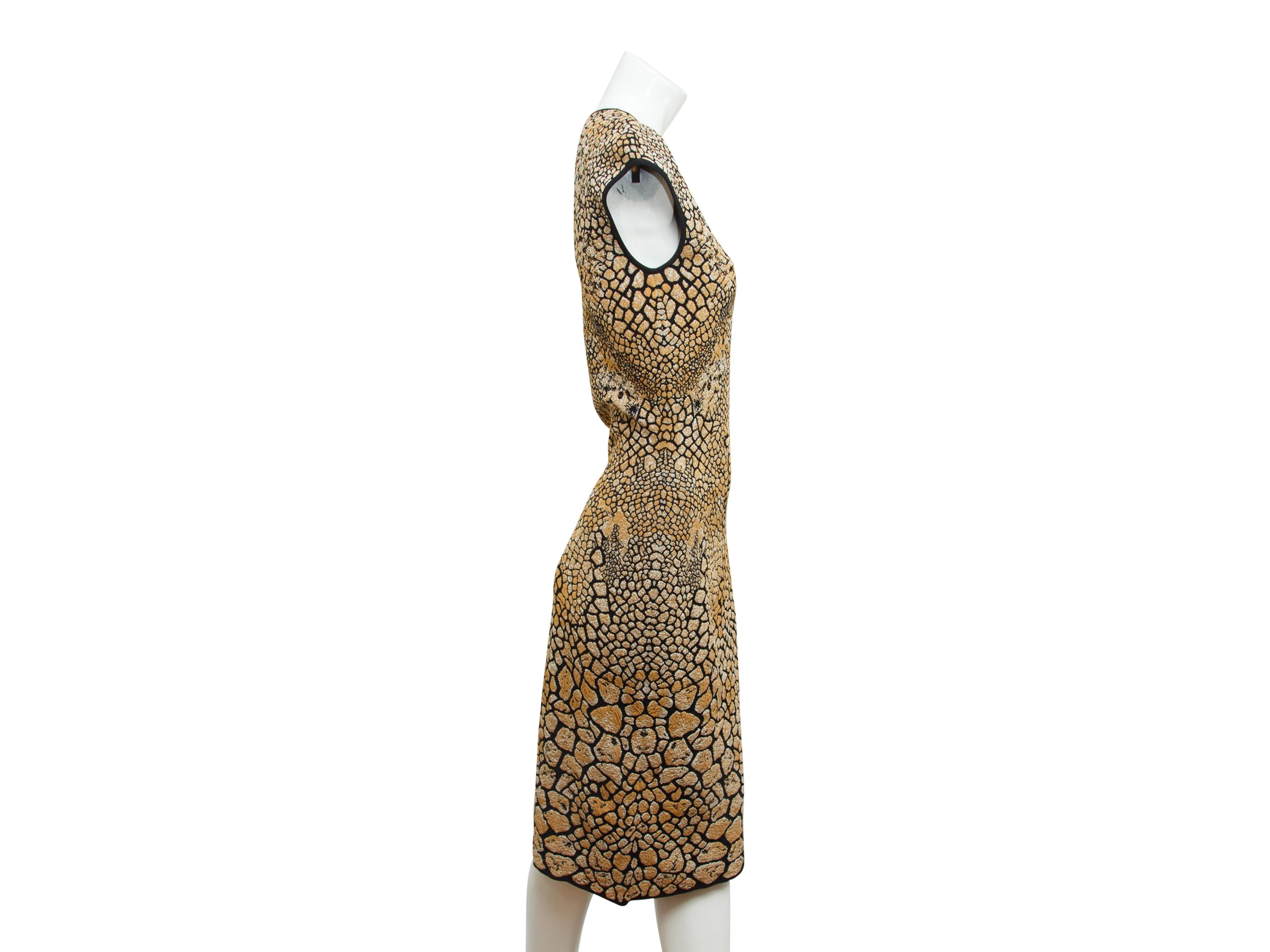 Product details:  Gold and black animal stretch sheath dress by Alexander McQueen.  Crewneck.  Cap sleeves.  Pullover style.  30