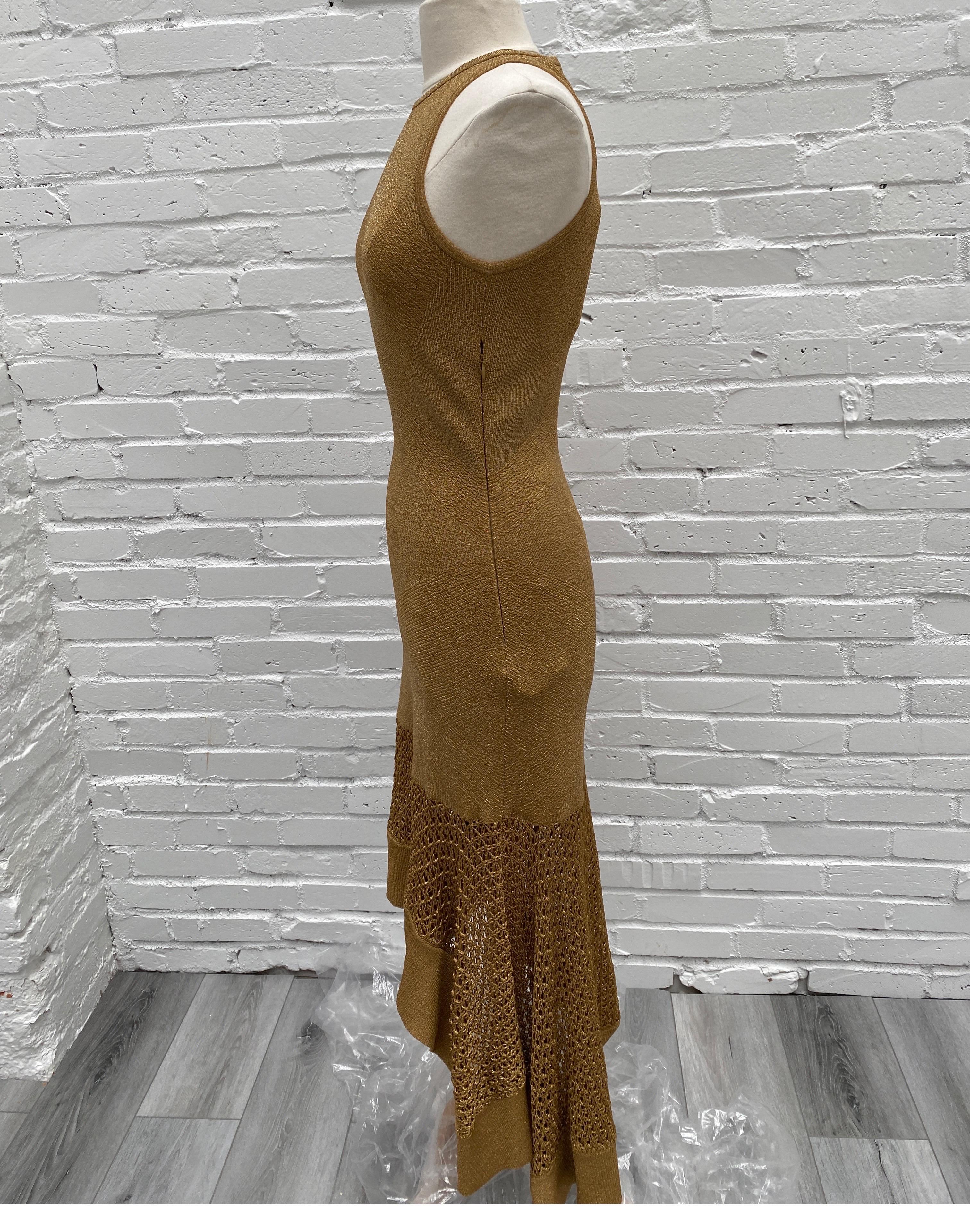 Alexander McQueen Gold Knit Evening Dress. Stunning long dress. Size 0-4. Has stretch so can be worn by a 6 even. Flattering cut. New with tags. Own an iconic designer piece. Guaranteed authentic. 