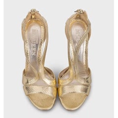 Alexander McQueen Sandalias doradas de tacón de aguja talla 38