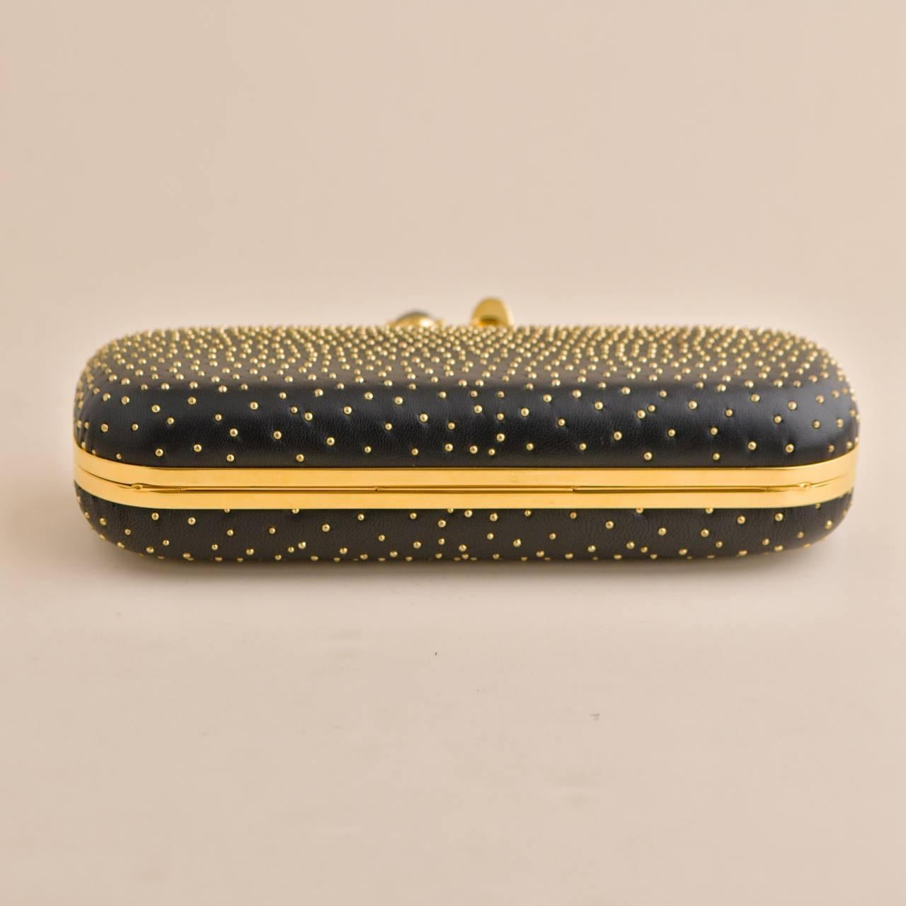 Alexander McQueen Gold Studded Four Ring Knuckle Clutch Bag 1