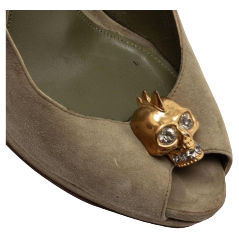 If you're someone who has a love for things that are edgy and unique, then Alexander McQueen's designs are perfect for you. These McQueen pumps are anything but dull. Luxuriously crafted from suede, they feature crystal-embellished, gold-tone skull