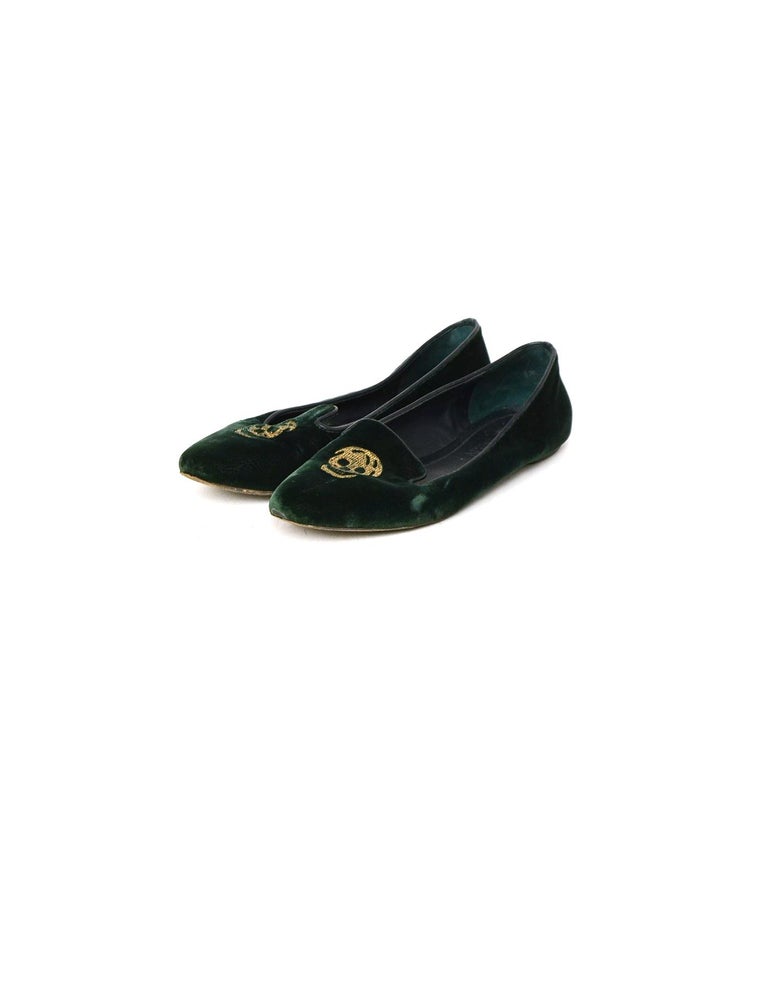 Alexander McQueen Green Velvet Skull Loafers sz 37

Made In: Italy
Color: Green
Materials: Velvet, Leather
Closure/Opening: Slip on
Overall Condition: Good pre-owned condition, wear on soles, heels, insoles, and tips. Scratches throughout exterior
