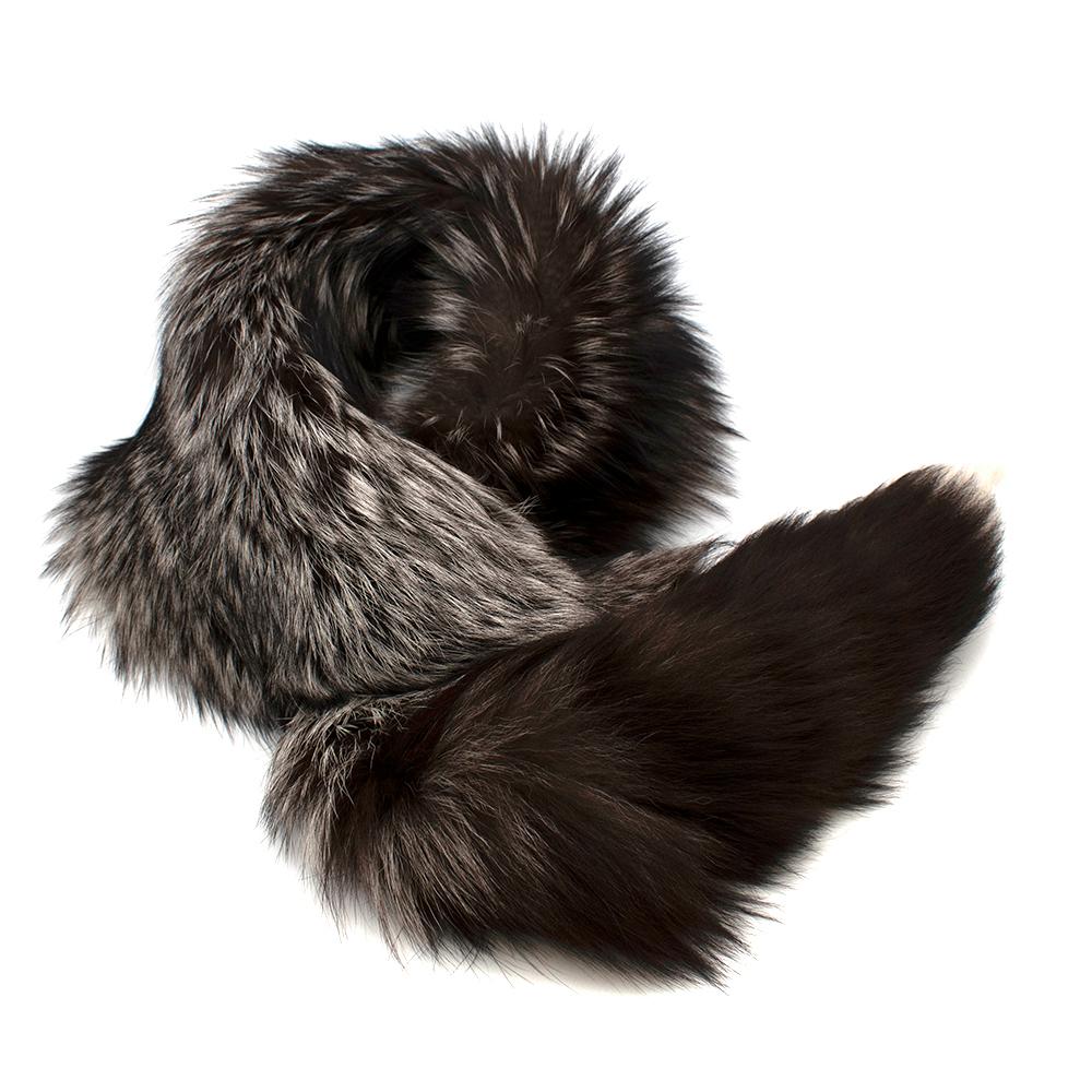 Alexander McQueen Grey Fox Fur Scarf

- Soft grey fox fur scarf
- Grey/ brown fur mix 
- Tail trim 
- Eyelet fastening 
- Fully lined 

Made in Italy 

Length - 69cm 
Width - 17cm