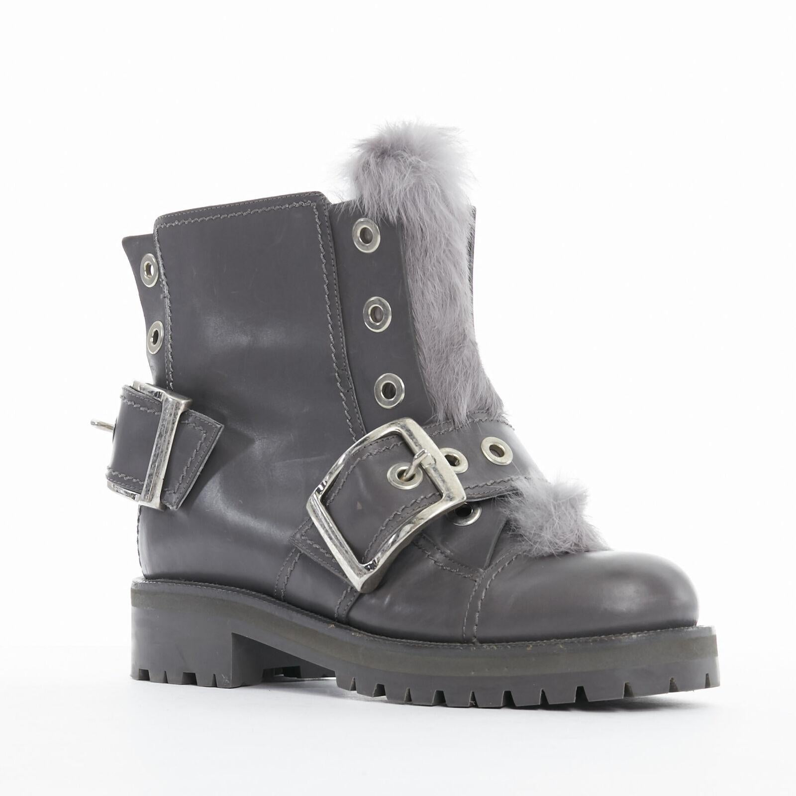 ALEXANDER MCQUEEN grey leather rabbit fur trimmed buckle combat boot EU38.5 
Reference: TGAS/A01325 
Brand: Alexander McQueen 
Designer: Sarah Burton 
Material: Leather 
Color: Grey 
Pattern: Solid 
Closure: Pull on 
Extra Detail: Rabbit fur