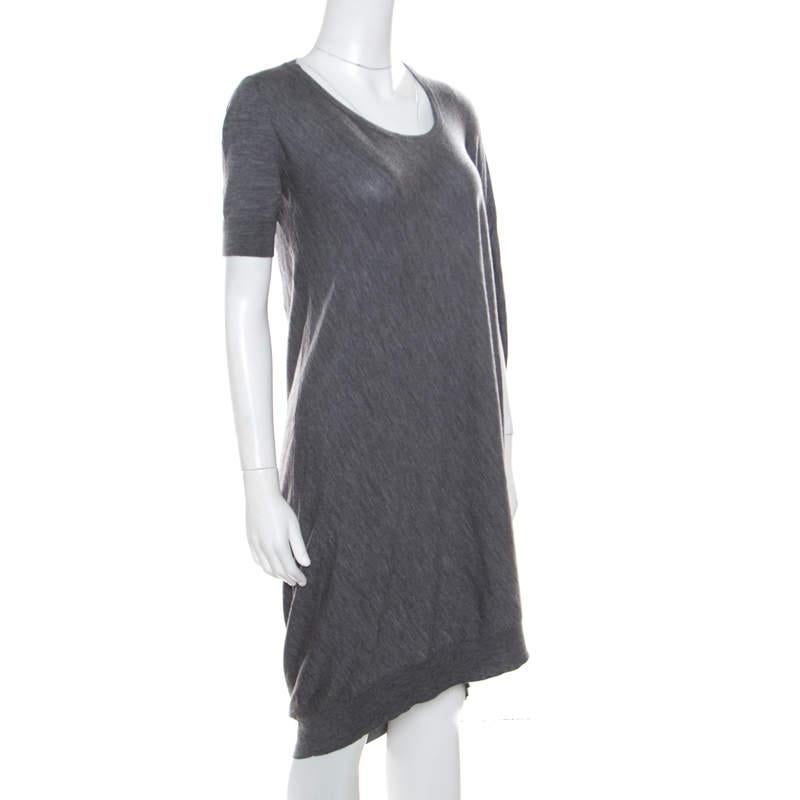 Simple, sophisticated and very stylish, this Alexander McQueen shift dress is a must buy! The grey creation is made of 100% wool and features a chic silhouette. It flaunts an asymmetrical sleeve detailing and comes with a round neckline. Sure to