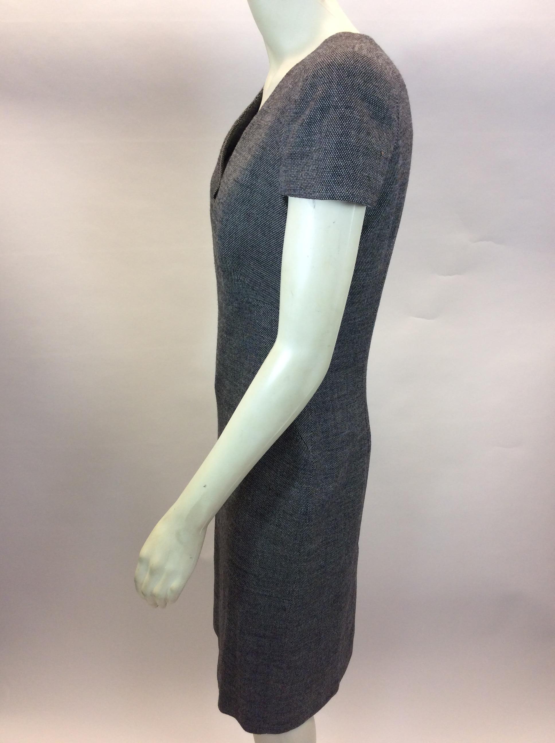 Alexander McQueen Grey Tweed Dress
$299
Made in Italy
97% Wool, 3% Elastane
Size 42
Length 39
