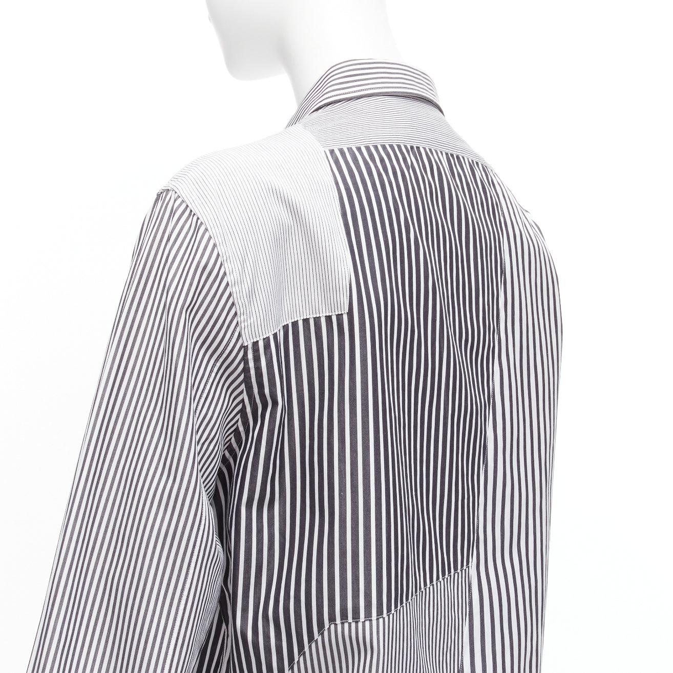 ALEXANDER MCQUEEN grey white cotton mixed stripes patchwork shirt Sz.16 L
Reference: CAWG/A00280
Brand: Alexander McQueen
Material: Cotton
Color: Grey, White
Pattern: Striped
Closure: Button
Extra Details: Holographic shell buttons. Stripe patchwork