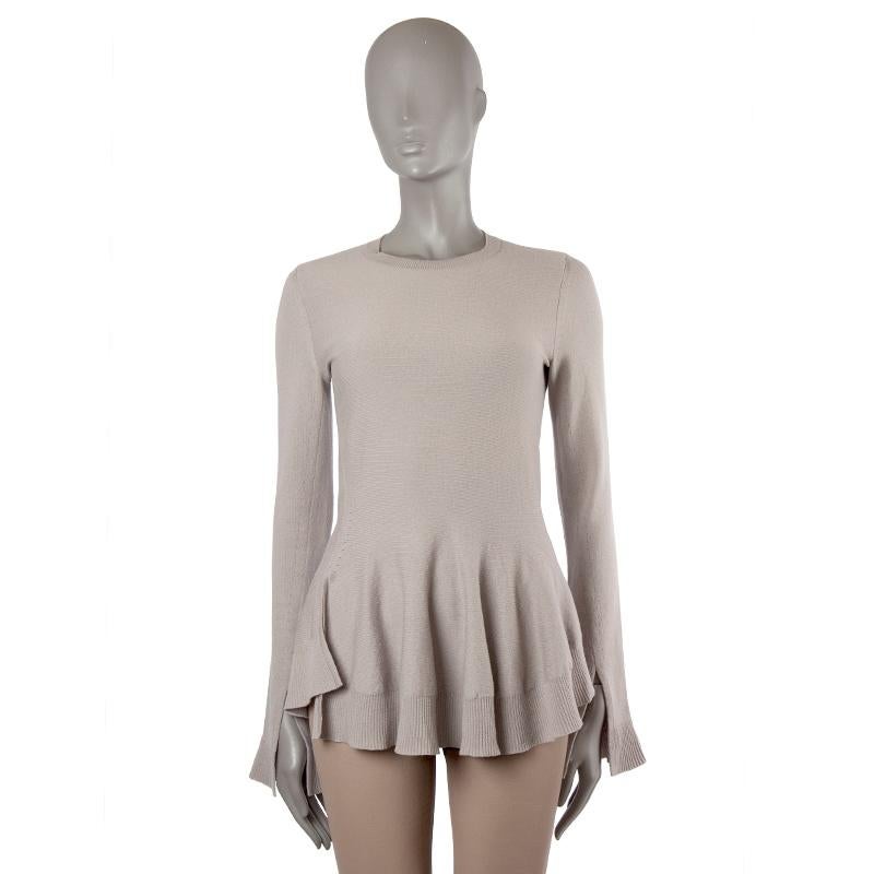 100% authentic Alexander McQueen crew-neck sweater in light taupe wool (70%) and cashmere (30%). With ribbed details, side slits, and flared hemline. Unlined. Has been worn and is in excellent condition.

Tag Size	M
Size	M
Shoulder Width	36cm