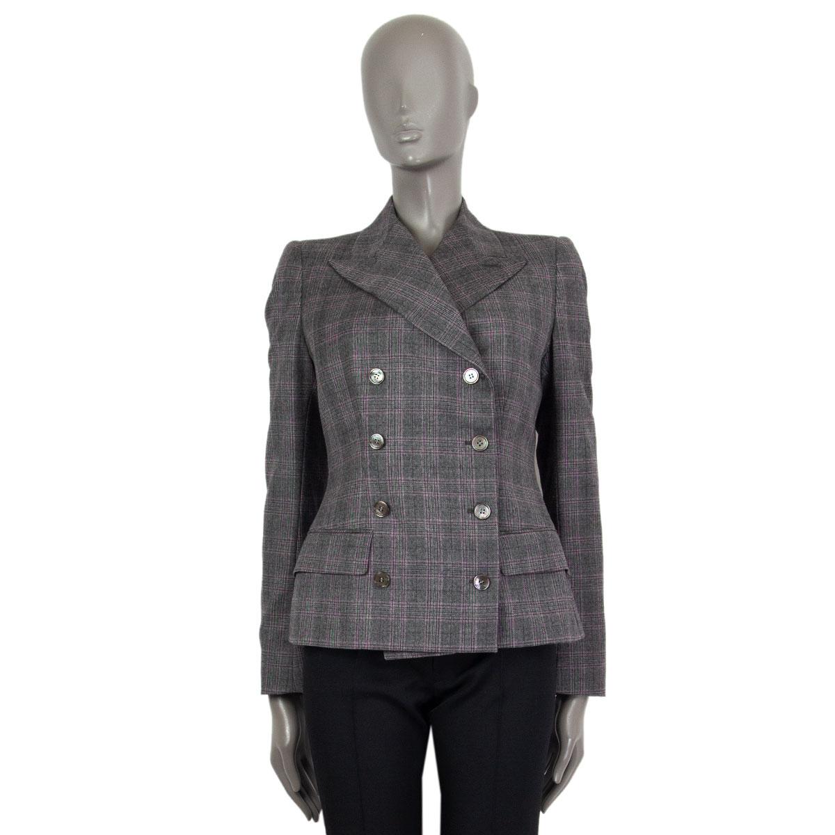 authentic Alexander McQueen double breasted checked blazer in gray/ black/ violet wool (95%) and cashmere (5%) with notch collar. Closes with four buttons on the front. Lined in gray acetate (52%) and viscose (48%). Has been worn and is in excellent