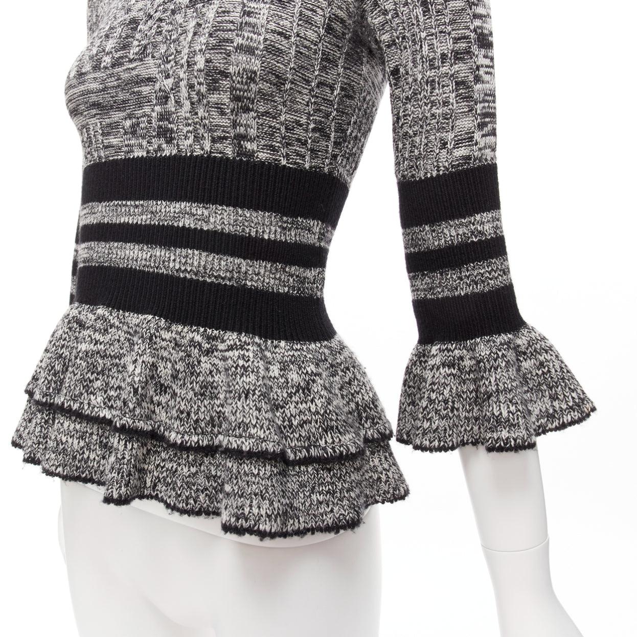 ALEXANDER MCQUEEN grey wool silk grey melange peplum pullover sweater S
Reference: TGAS/D01058
Brand: Alexander McQueen
Material: Wool, Silk, Blend
Color: Grey, Black
Pattern: Striped
Closure: Keyhole Button
Extra Details: Keyhole back.
Made in: