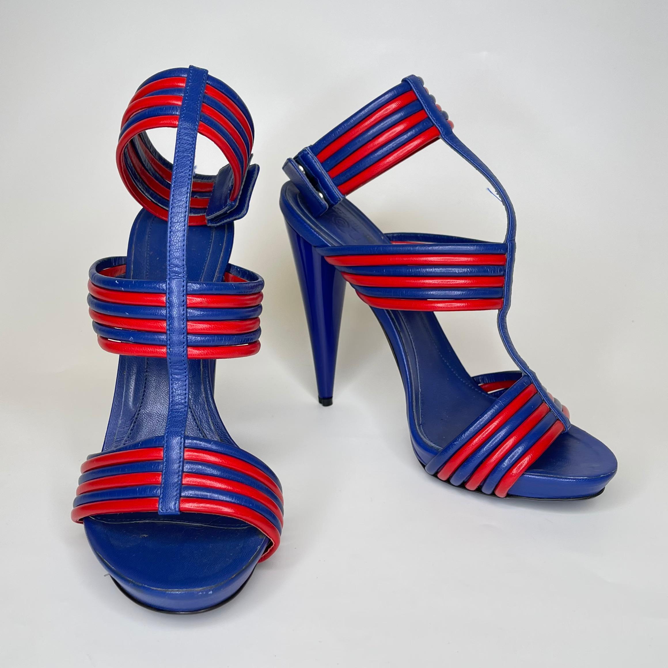 COLOR: Blue/red
MATERIAL: Leather
SIZE: 39.5 EU / 6.5 US
HEEL HEIGHT: 100 mm (4 in)
COMES WITH: Original box 
CONDITION: Good - light wear to the bottoms with scrapes, scuffs and marks. Faint marks throughout. Signs of leather aging to the