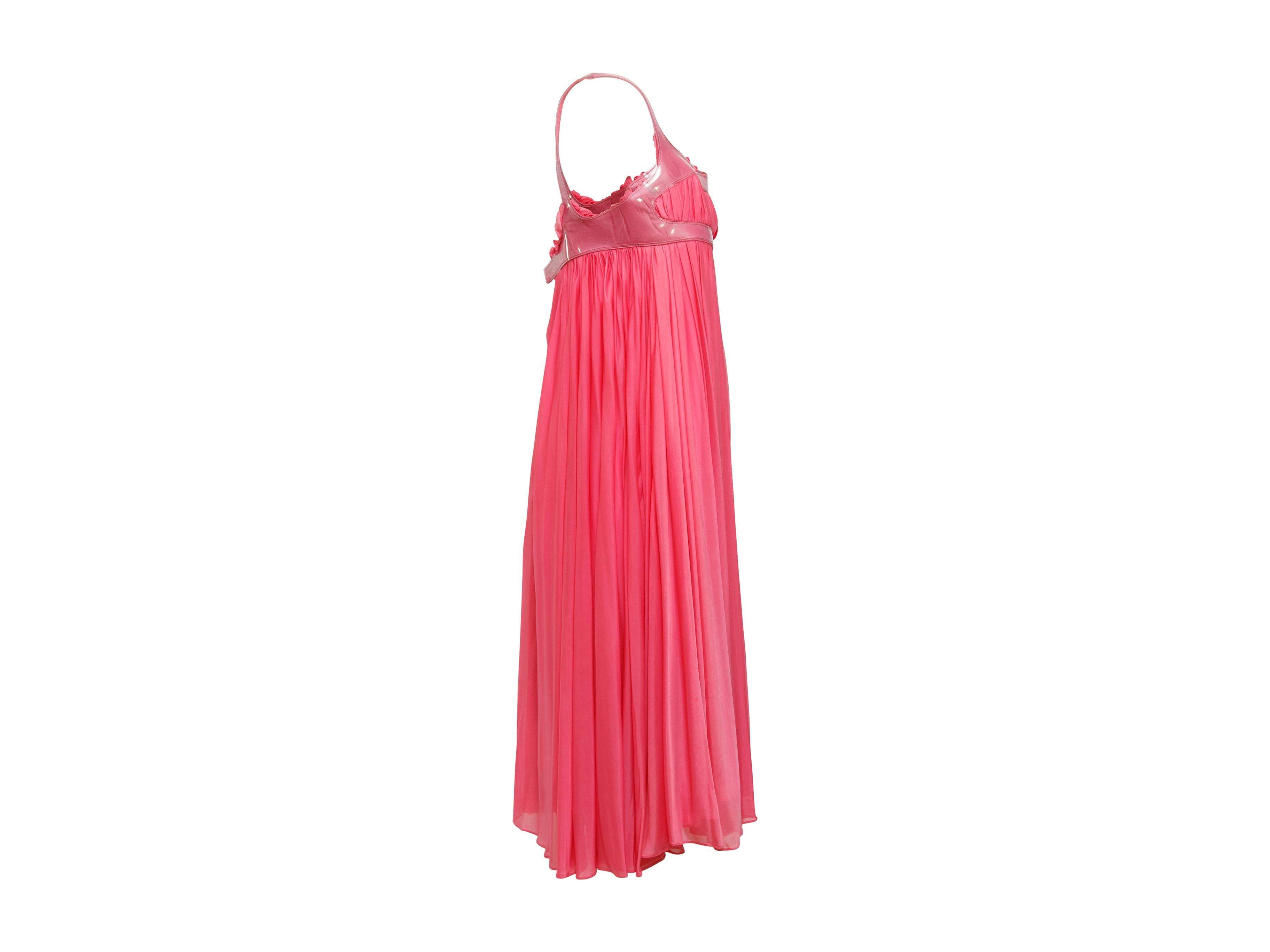 Product details:  Hot pink pleated babydoll dress by Alexander McQueen.  Trimmed with vinyl.  Sleeveless.  Empire waist.  Concealed hook back closure.  Label IT 40.  29