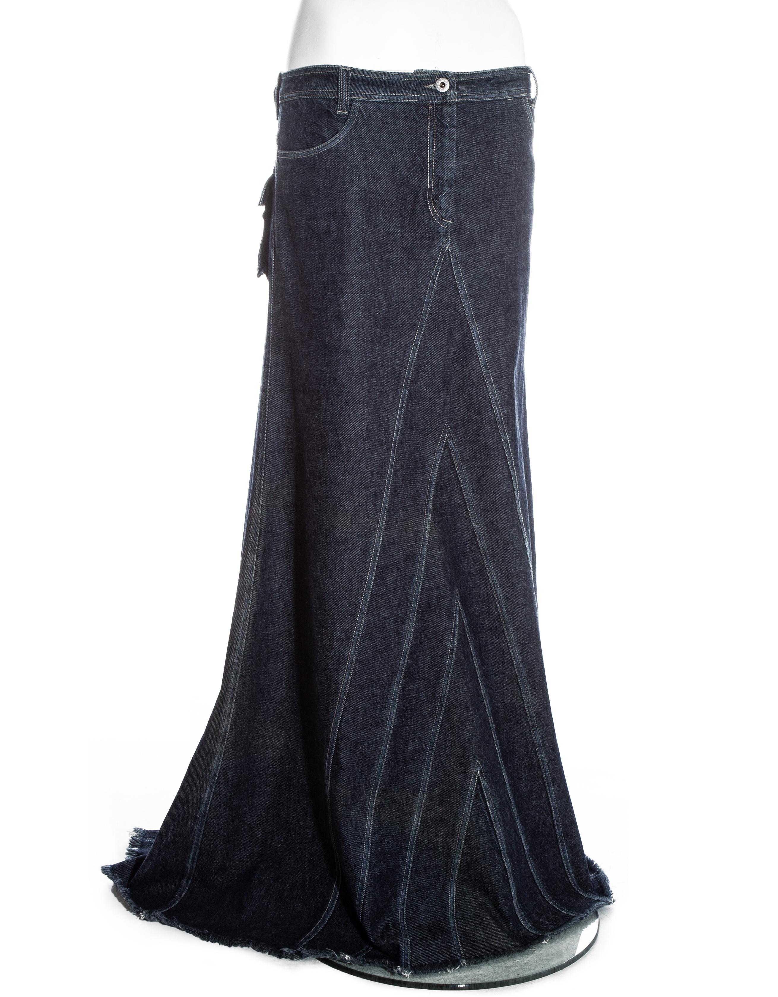 Alexander McQueen indigo denim bias cut maxi skirt with two back flap pockets and frayed hem.

Fall-Winter 1996