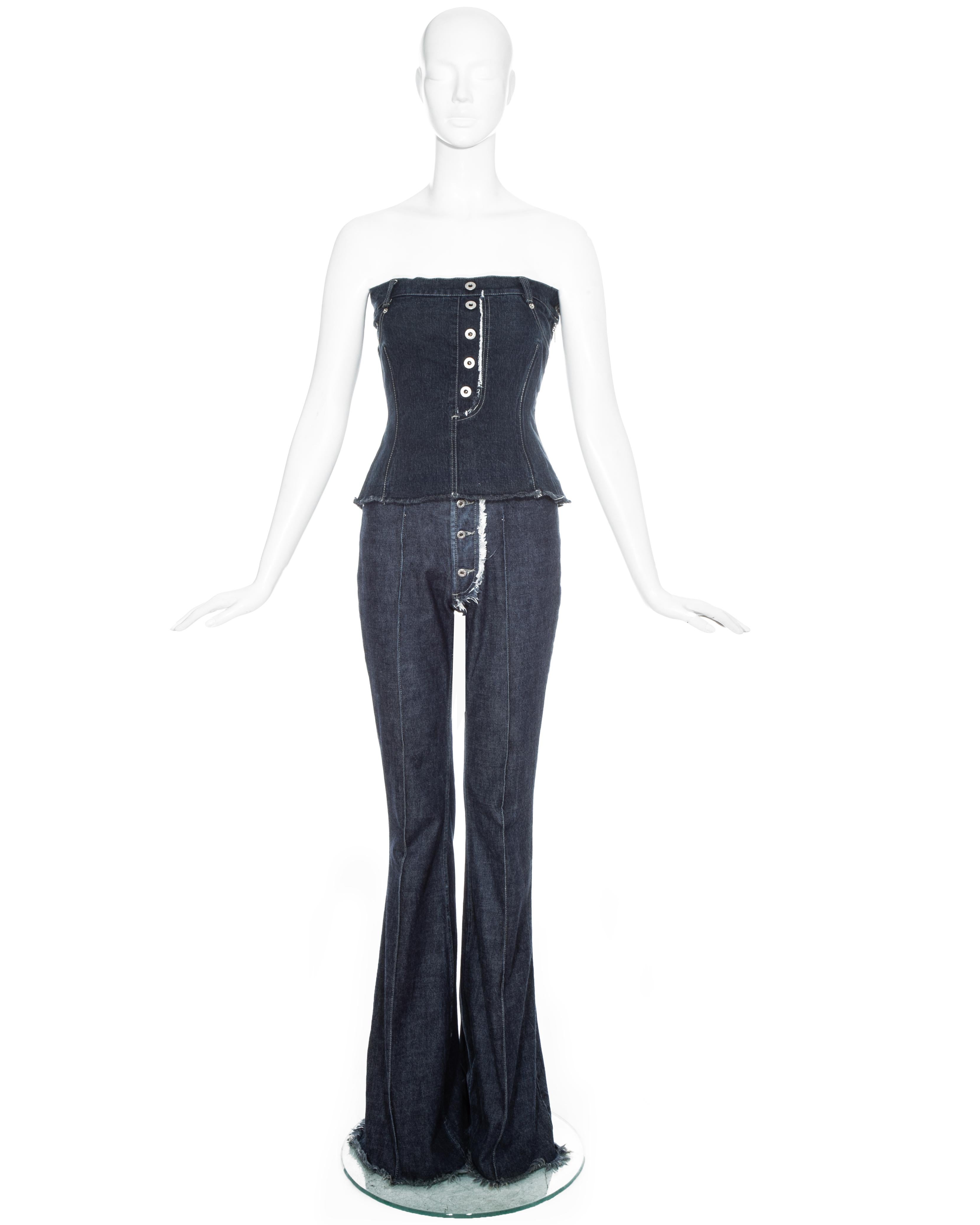 Alexander McQueen indigo denim bustier corset and high waisted flared jeans ensemble with contrast stitch and frayed trim. 

Fall-Winter 1996