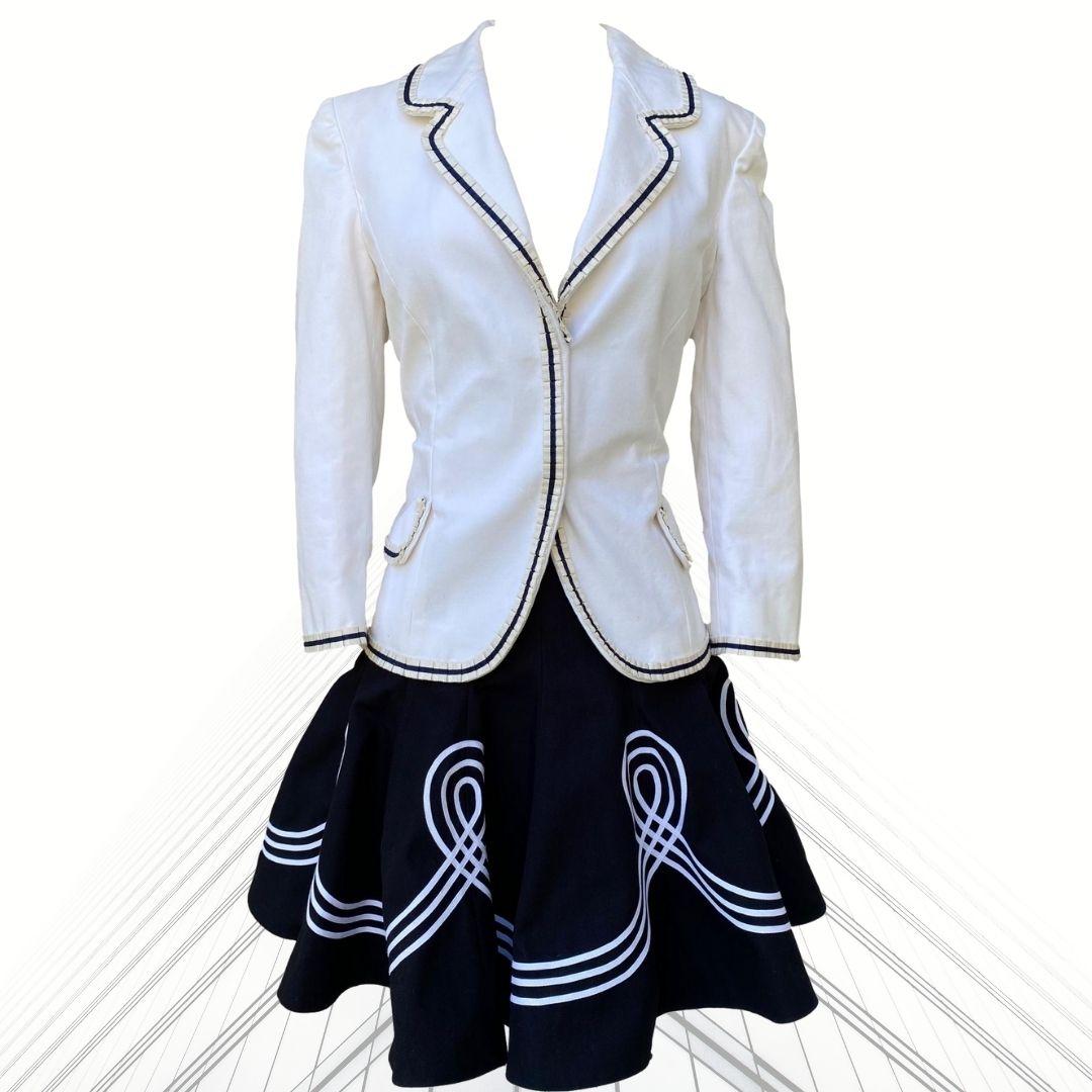 Alexander McQueen - Sailor Suit - skirt & jacket as shown on the runway from It's Only A Game collection.  White jacket is trimmed in navy with 2 pocket welts and invisible button jacket closure.  The full circle skirt is adorned with white nautical