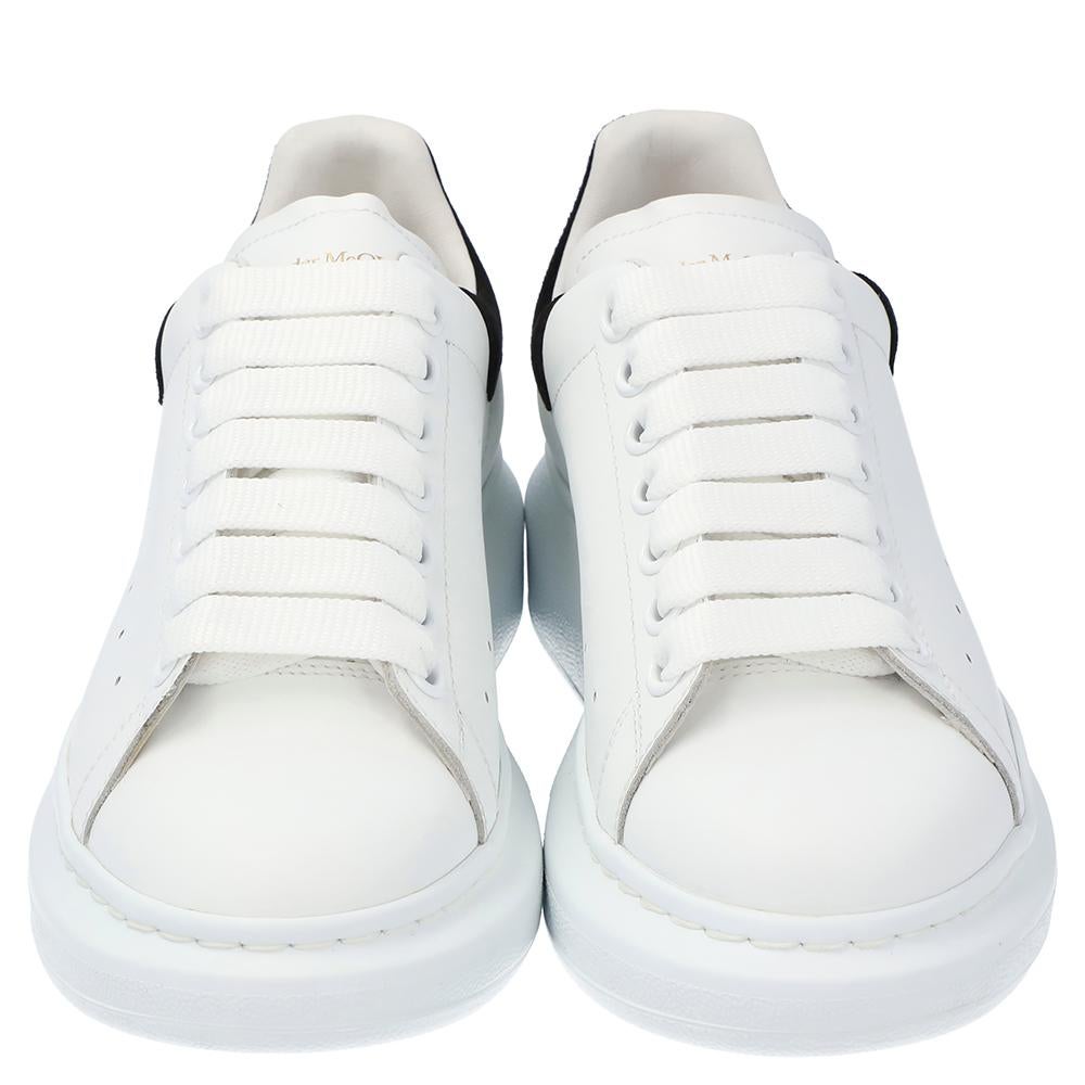 Made from high-quality leather, these Alexander McQueen sneakers are designed in a low-top style. They feature round toes, lace-ups on the vamps, and brand logo detailing on the heel counters. They are complete with comfortable leather-lined insoles
