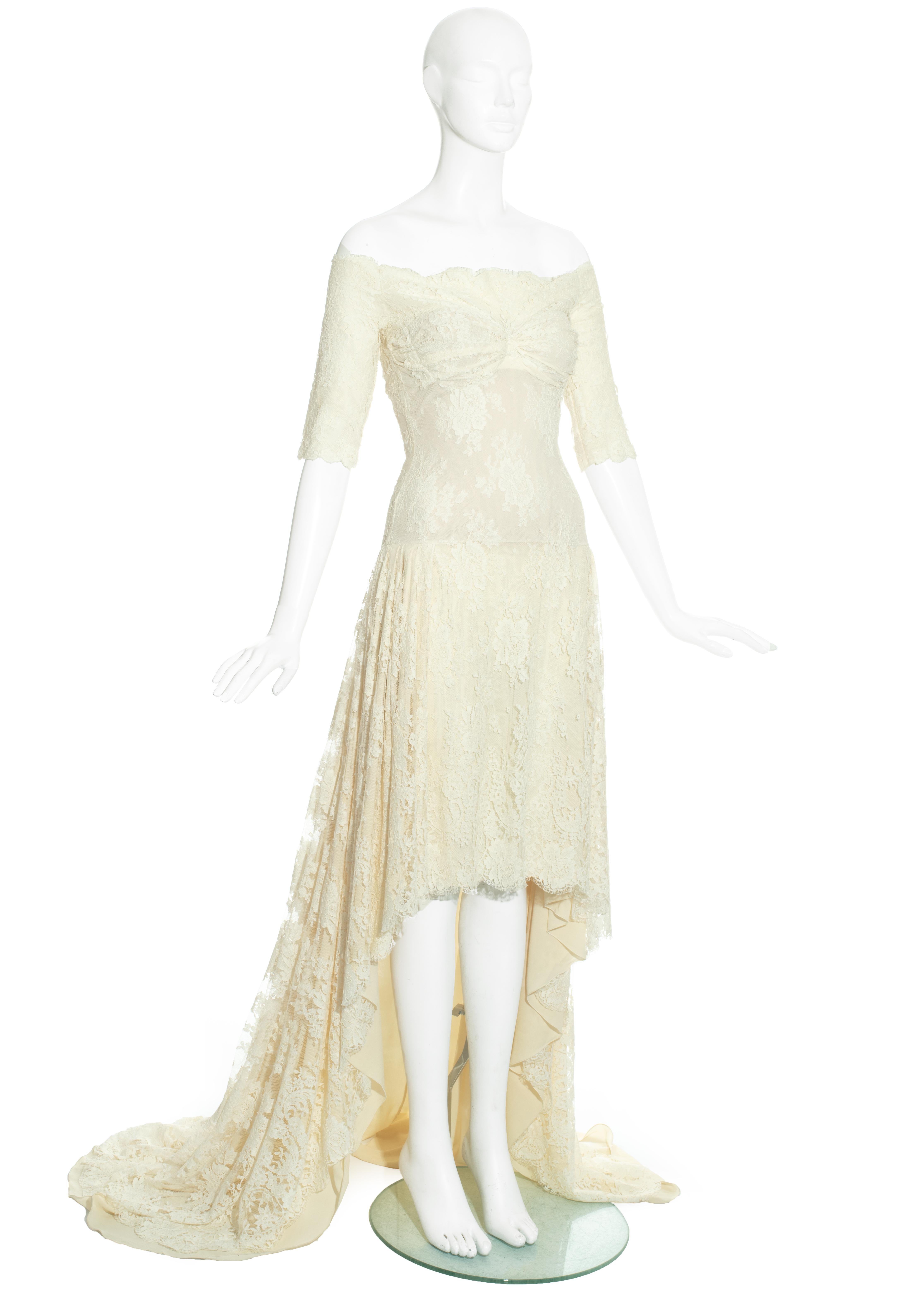 Alexander McQueen ivory lace evening dress with internal corset, dropped shoulders and the skirt cut short at the front and long trained hem.

'Sarabande', Spring-Summer 2007